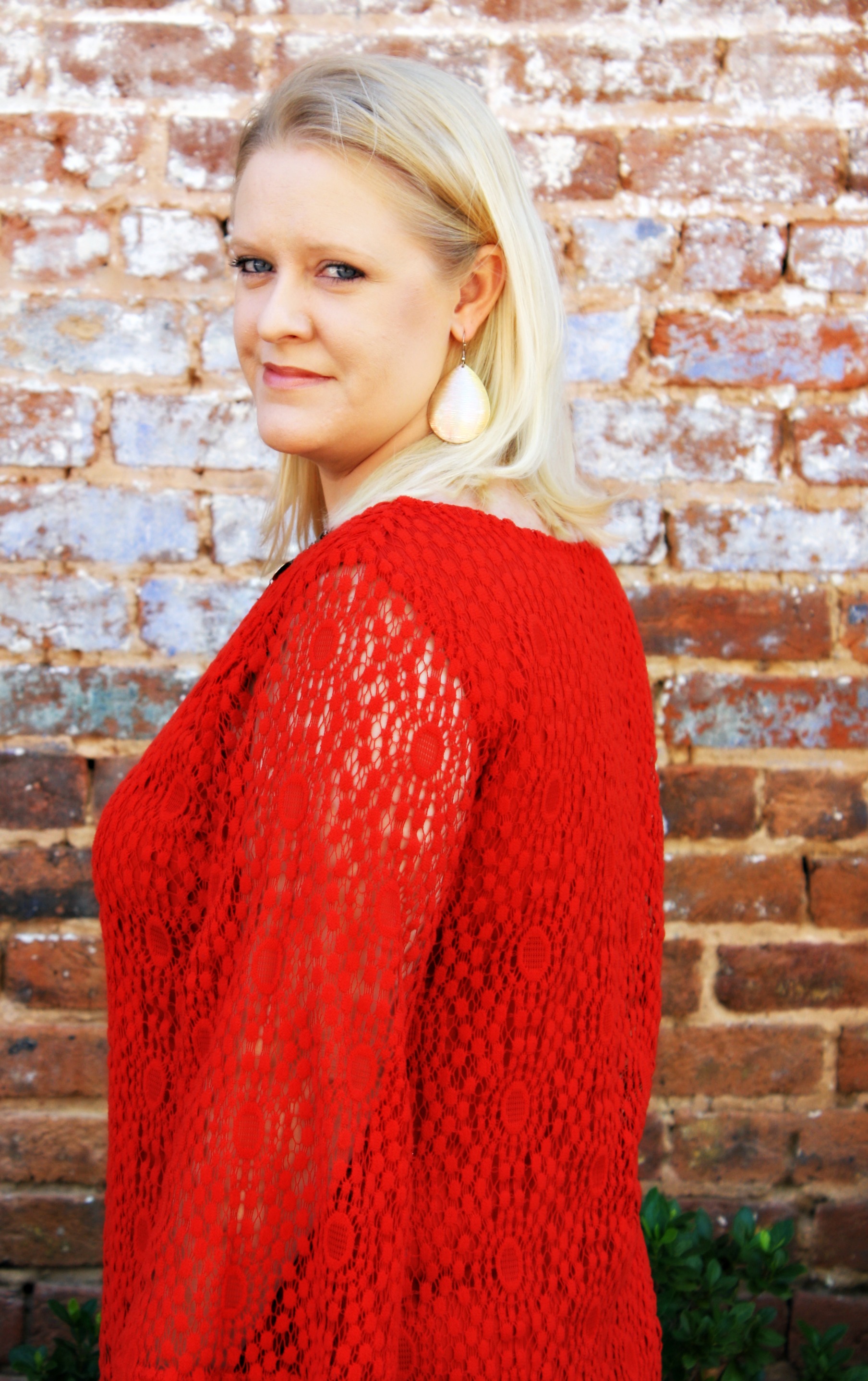 Nikki Sword - Realtor-EXP Realty LLC logo