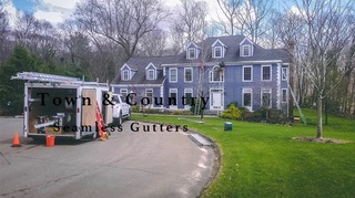 Town & Country Seamless Gutters logo