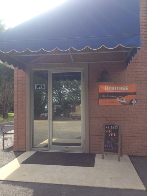 Heritage Collision & Auto Body logo