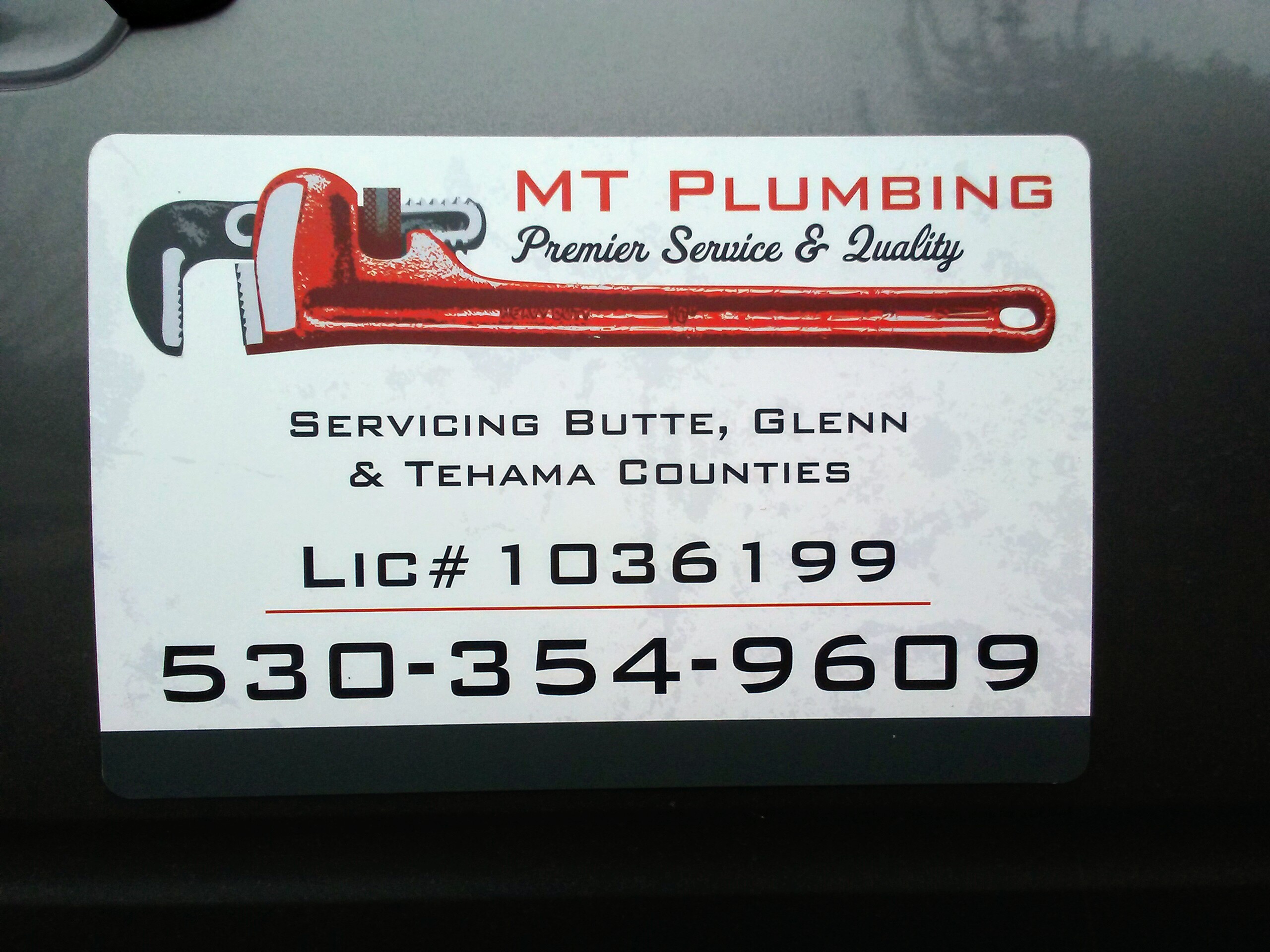 MT Plumbing logo