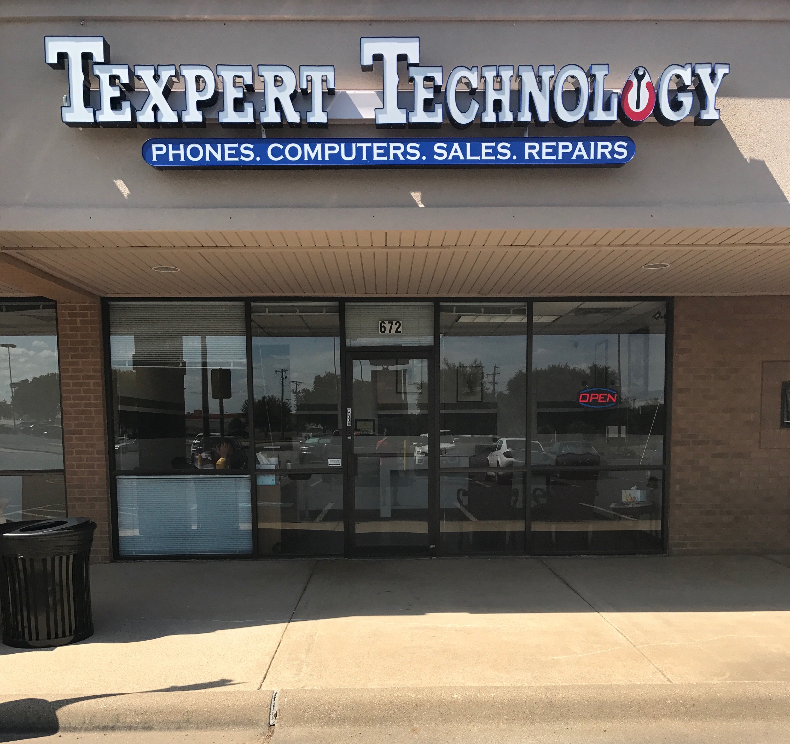 Texpert Technology logo
