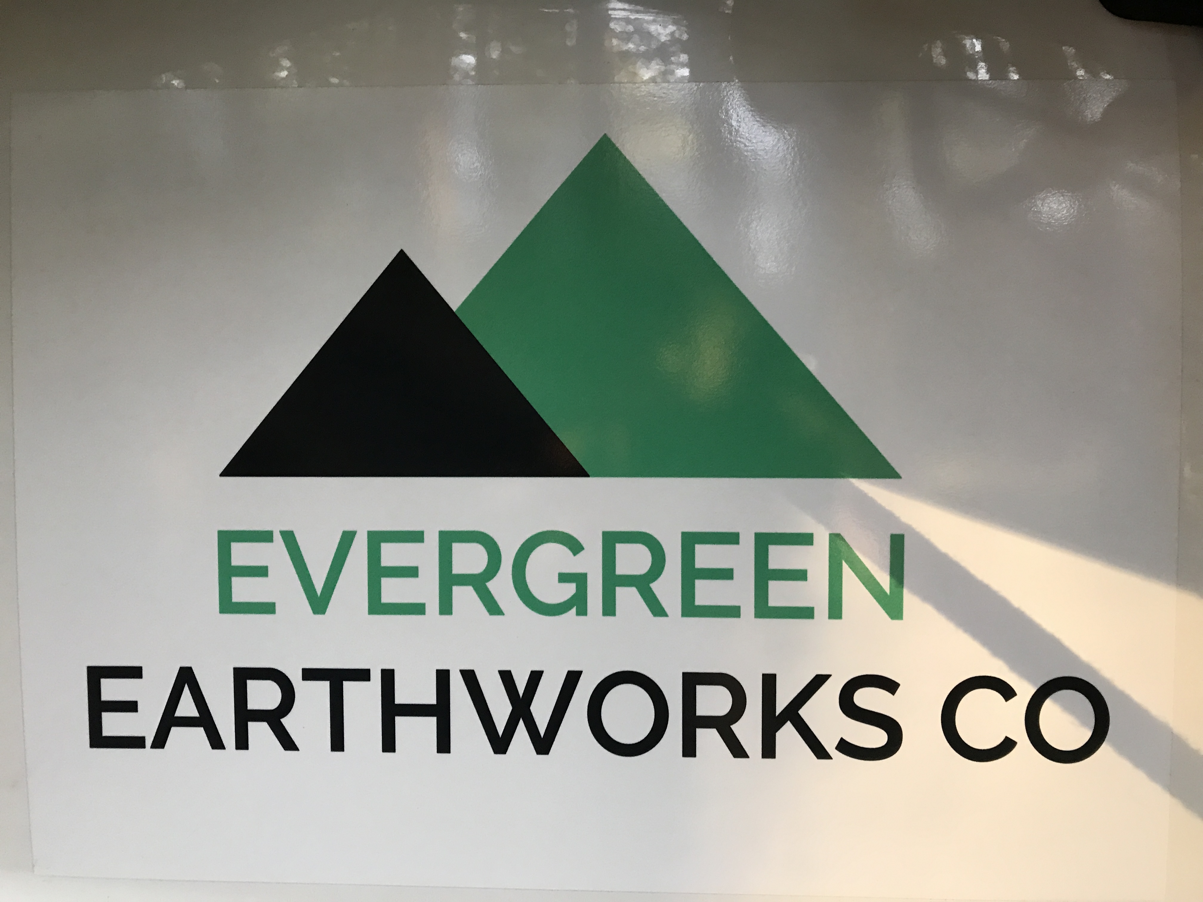 Evergreen Earthworks Co. logo