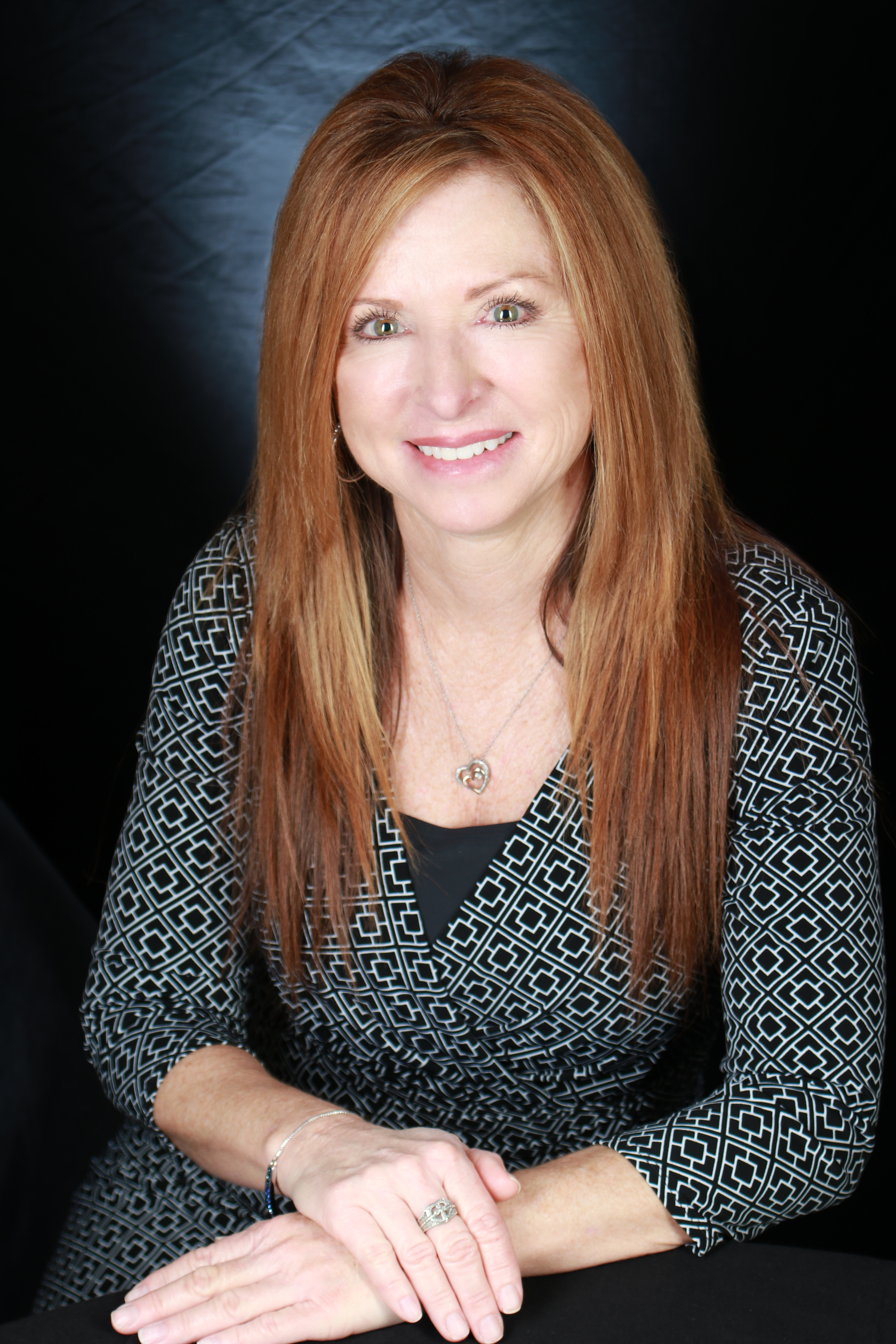 Lisamarie Sandoval Realtor - RealtyONE Group logo