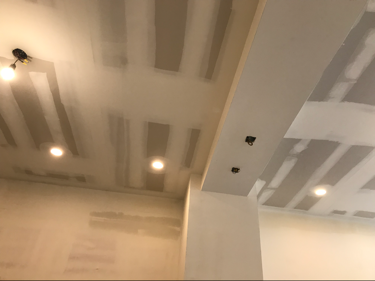 Roger Kuzmier Interior Finishes, LLC. logo