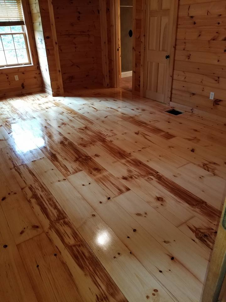 Ronnie Jrs Hardwood Floors logo