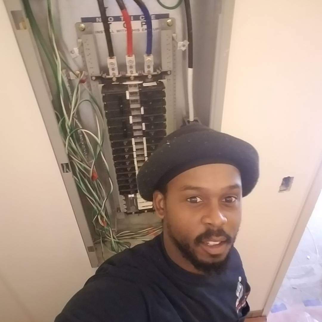 Tarique Wilson electrician logo