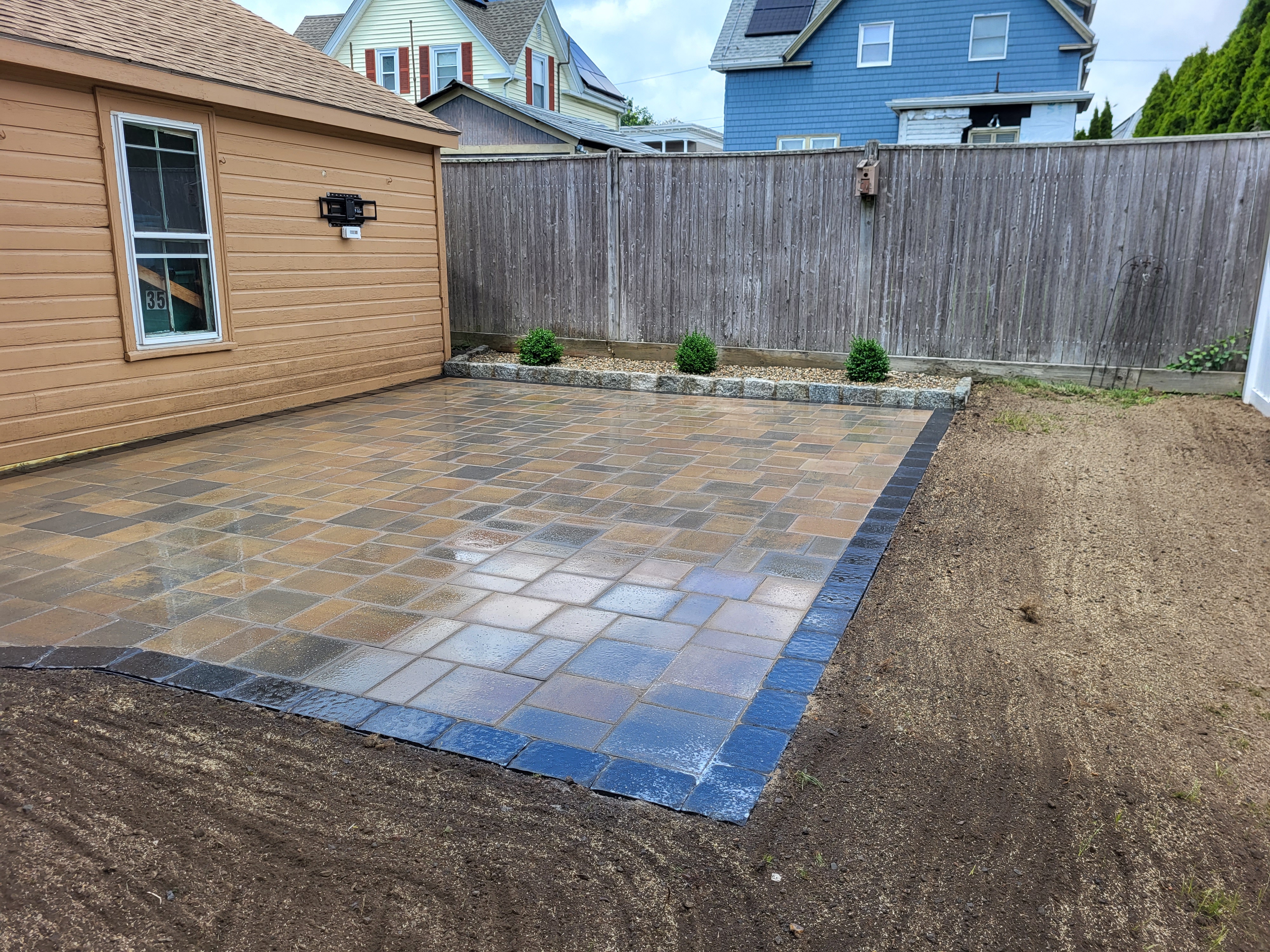 Logo for M&E Construction and Landscaping