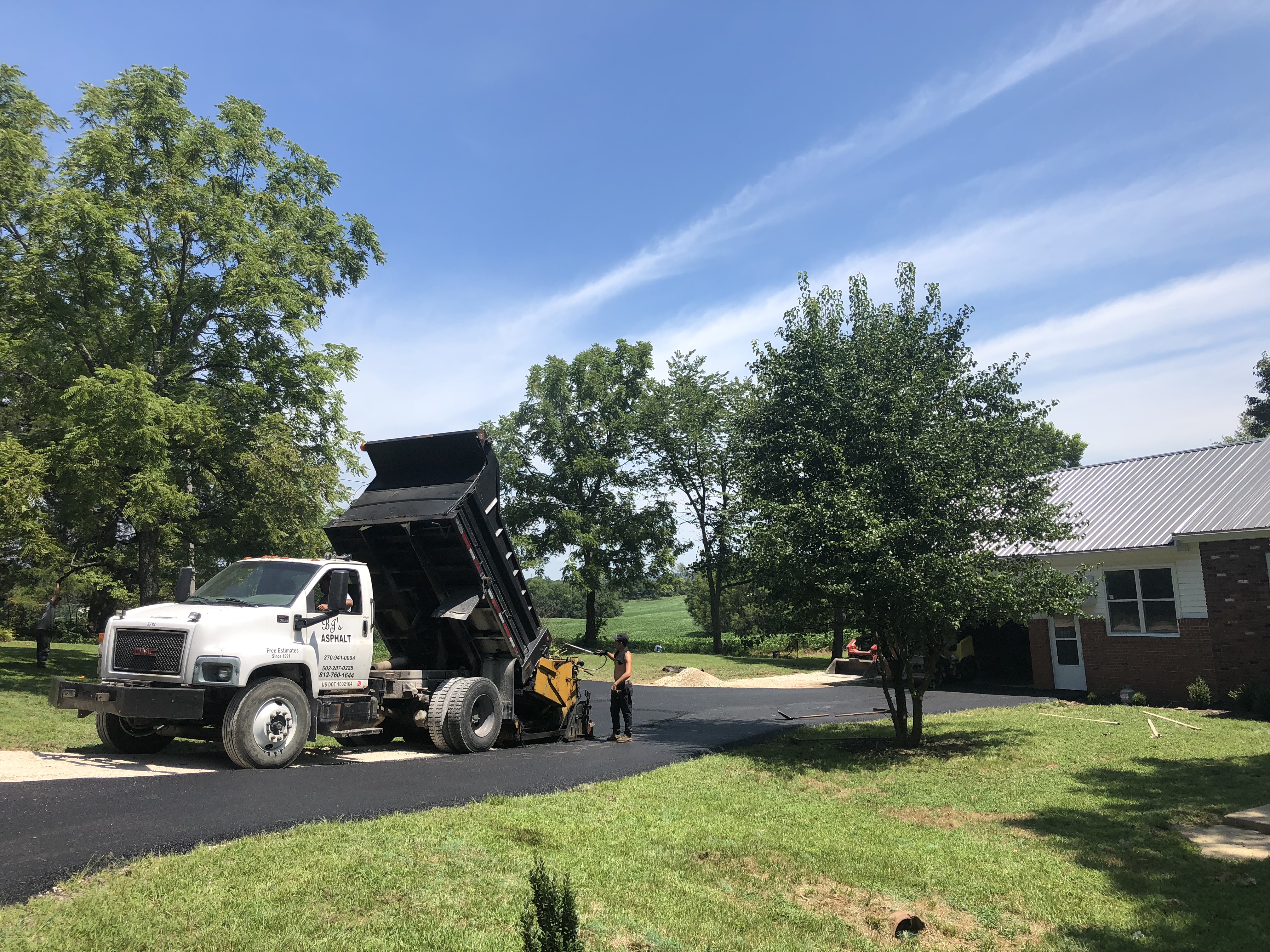 Logo for BJ's Asphalt Paving