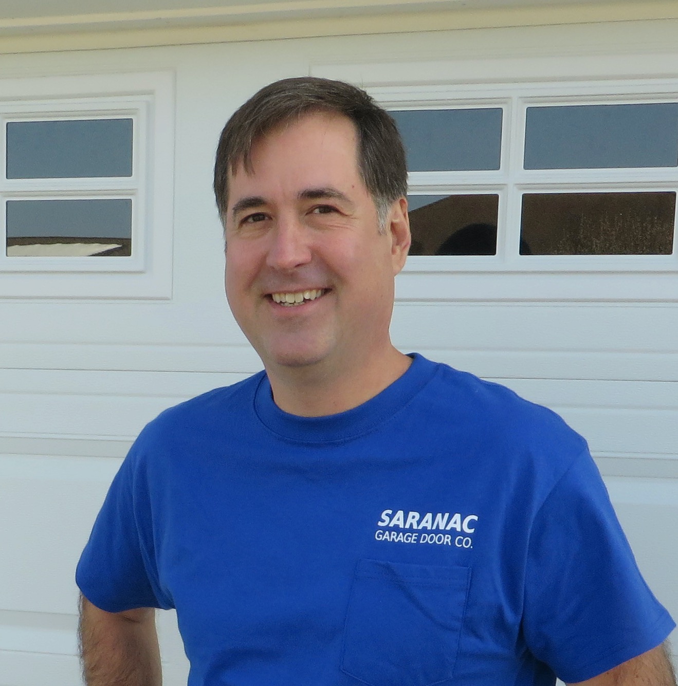 Saranac Garage Door Co. logo