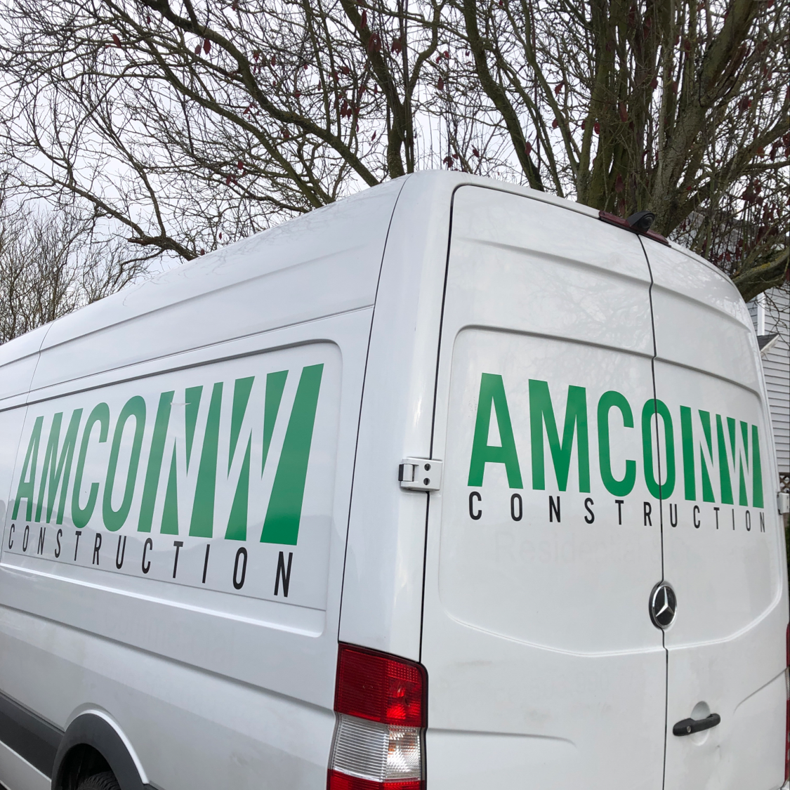 Logo for AMCO NW CONSTRUCTION, LLC
