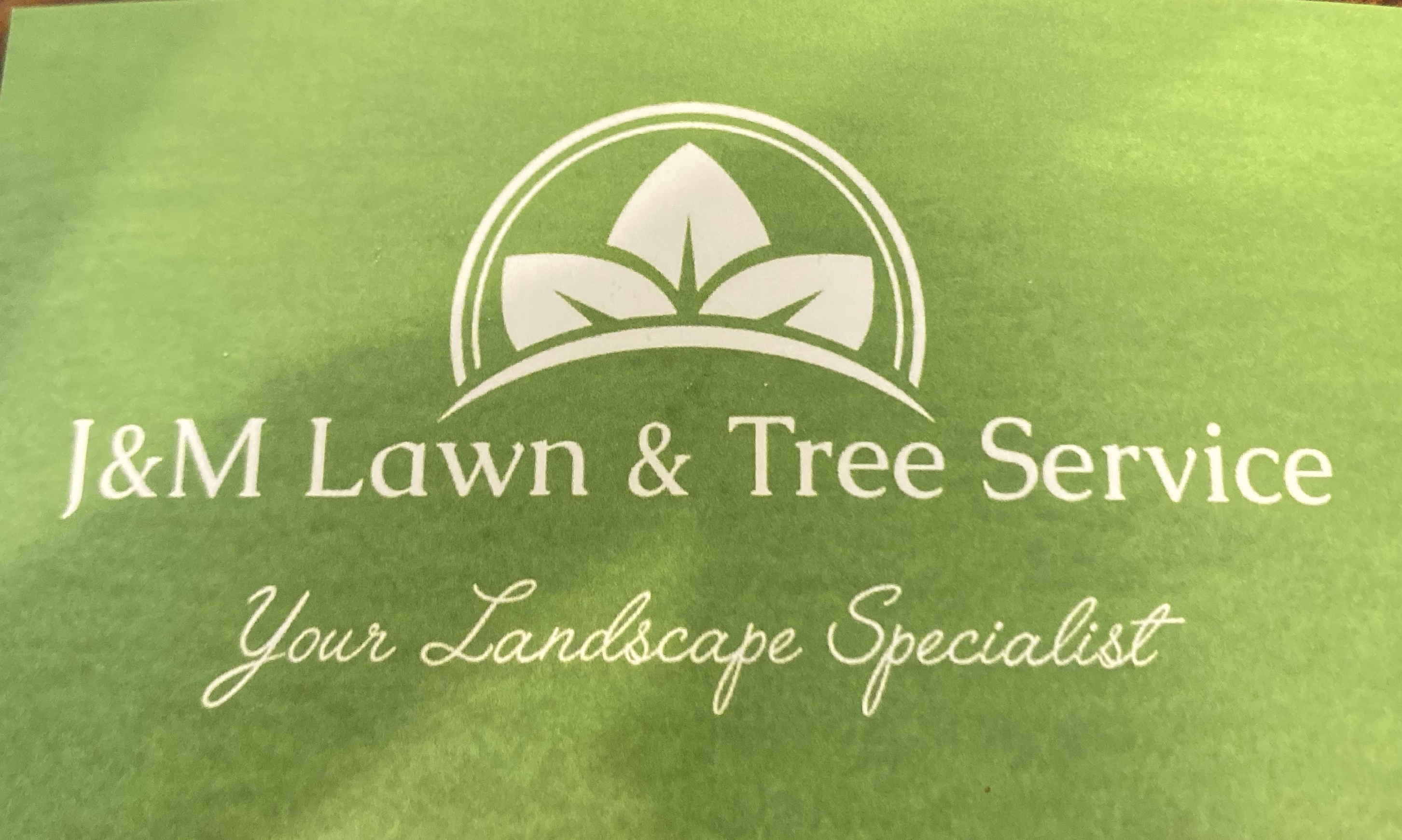 Logo for J&M Lawn and Tree Service