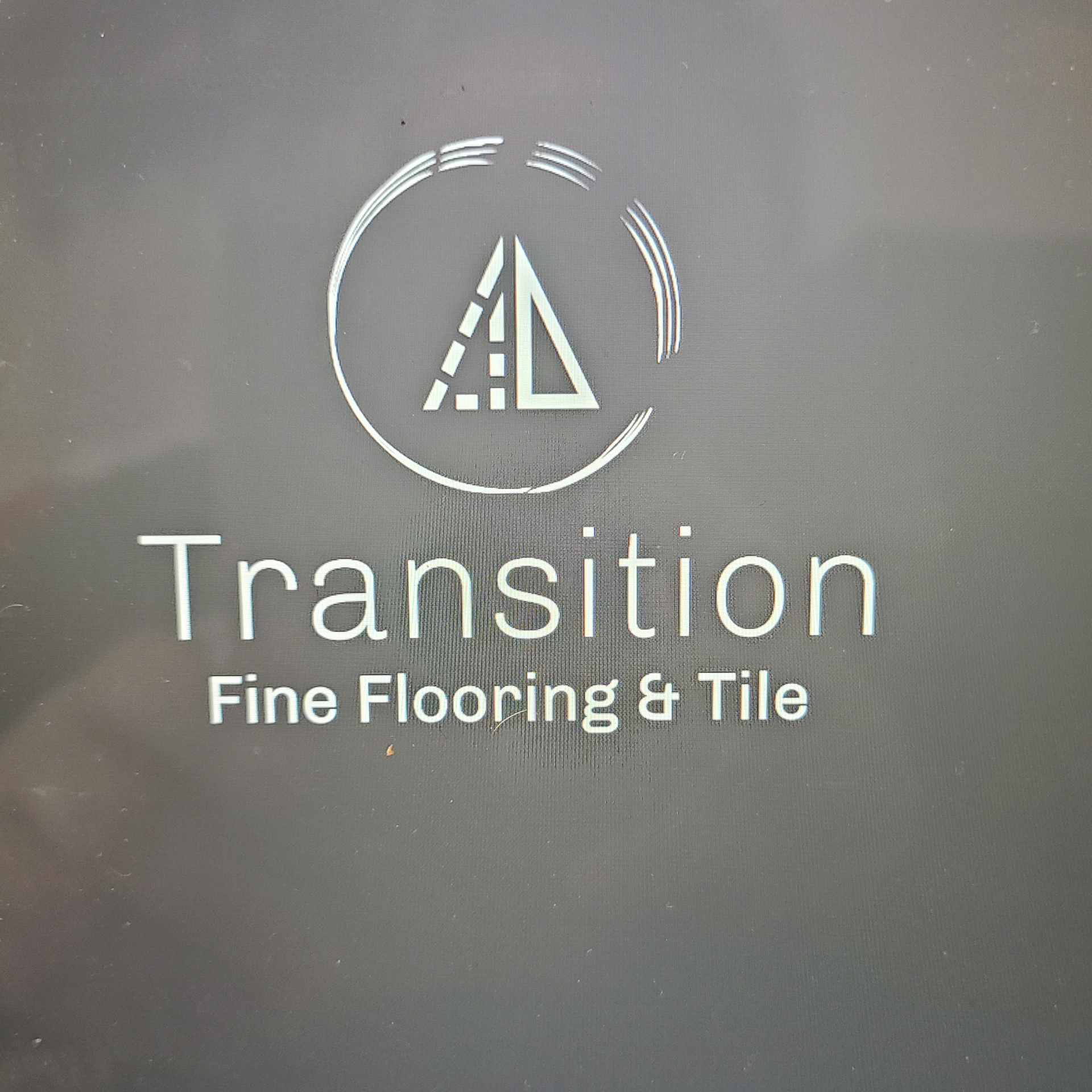 Transition Construction LLC logo