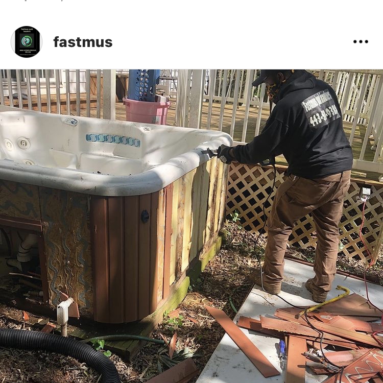 Fastmus junk haulers,LLC logo
