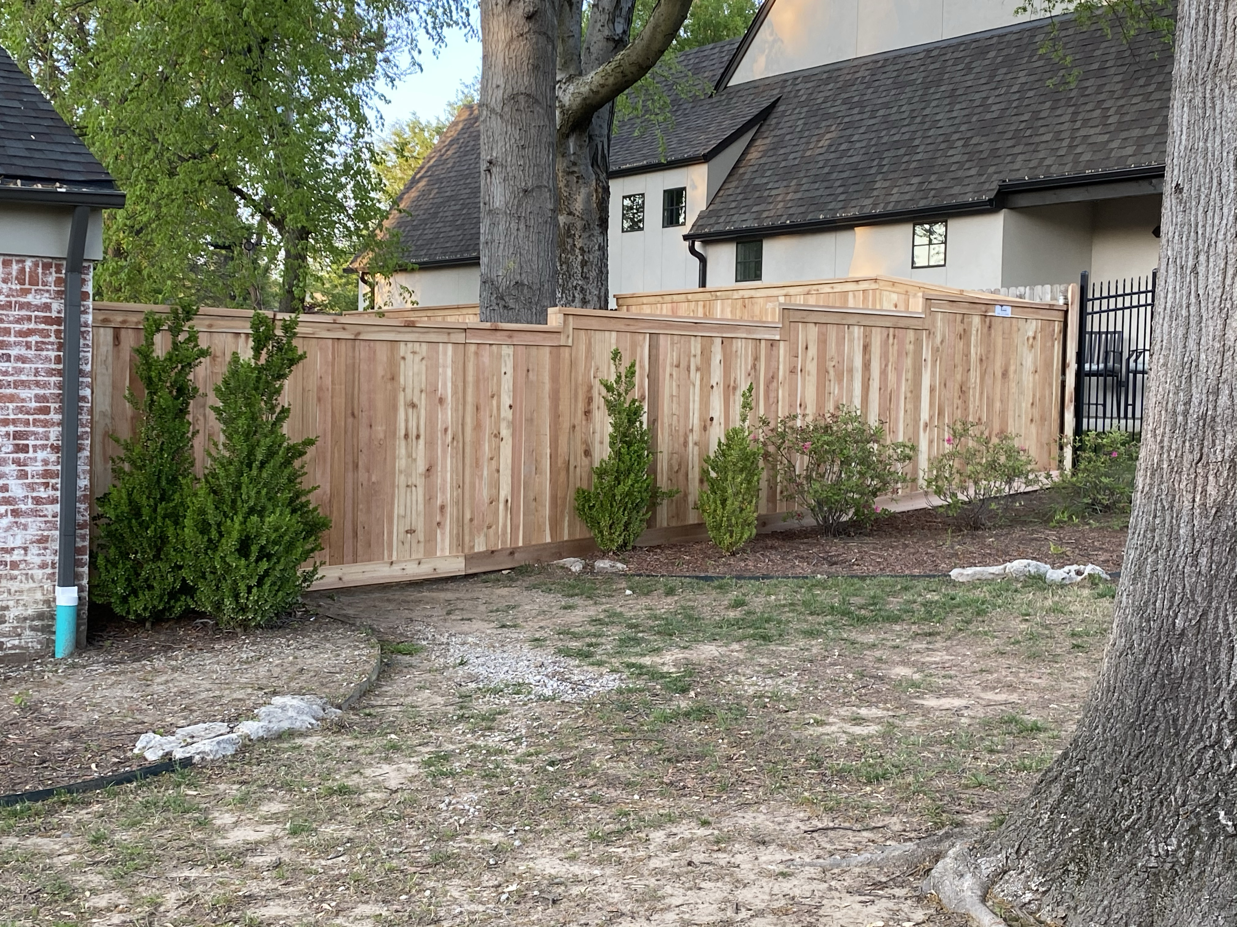 Logo for T-Town Fence & Gate
