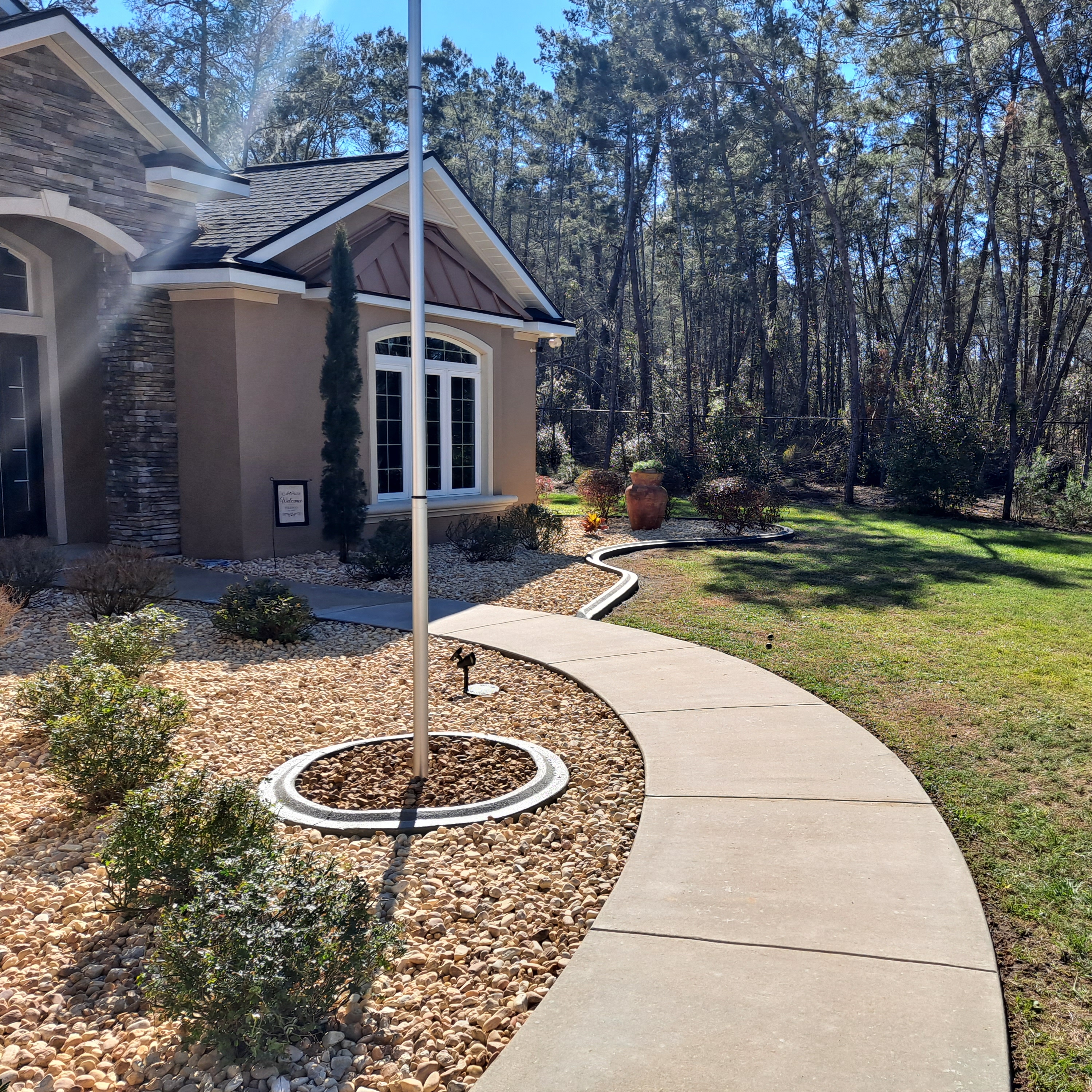 S&H Lawncare & Landscaping logo