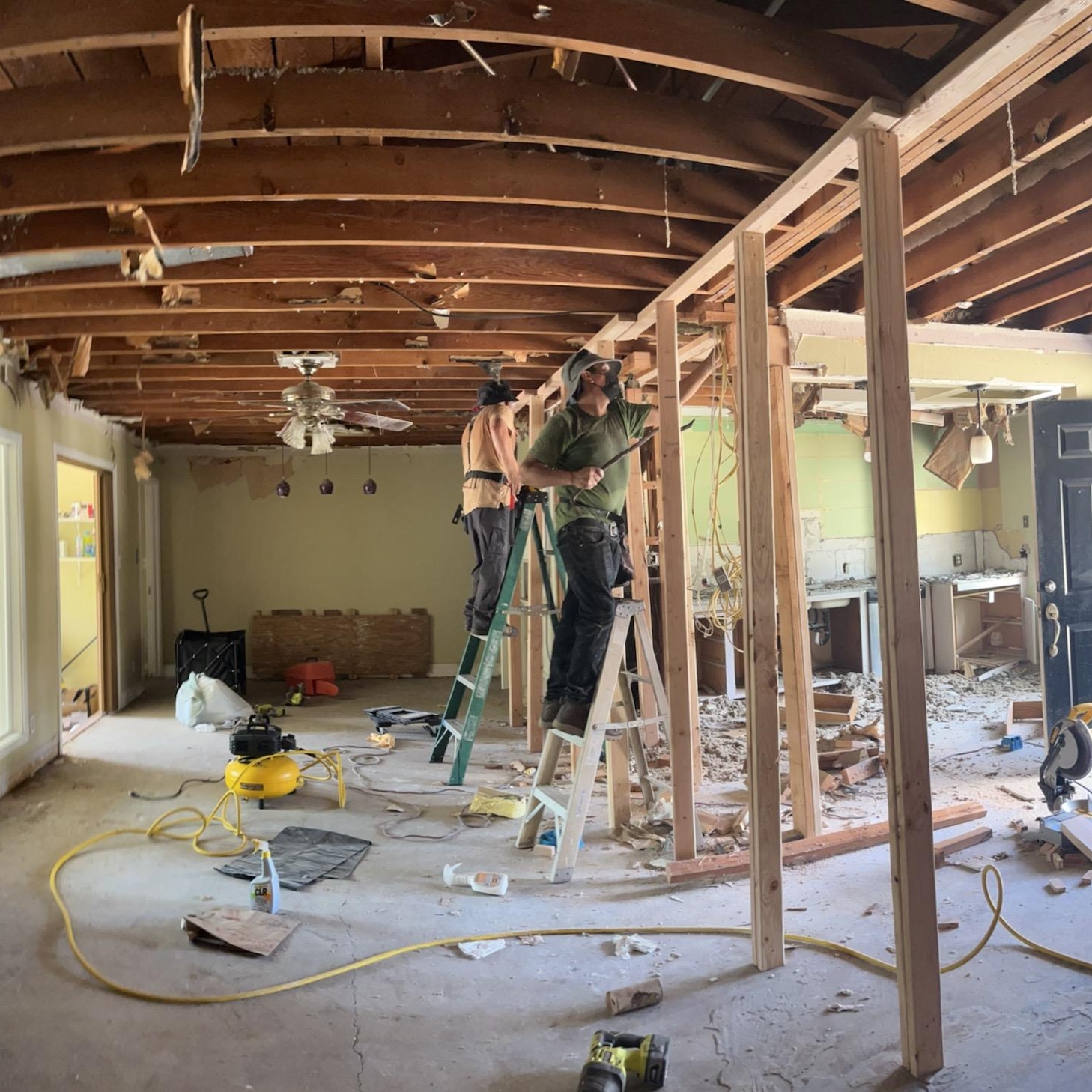 Taquia Handyman logo