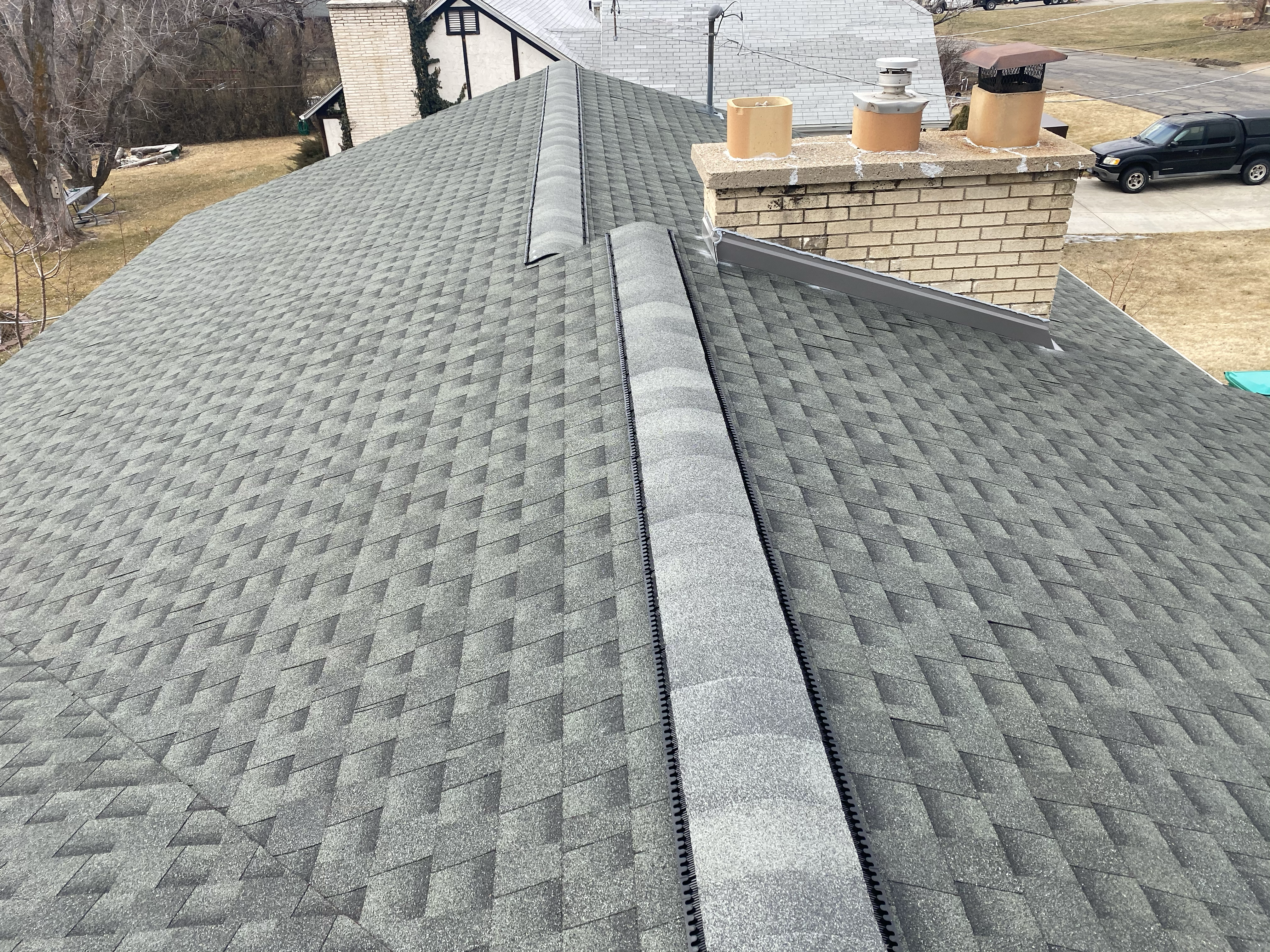 J. Torres Roofing logo