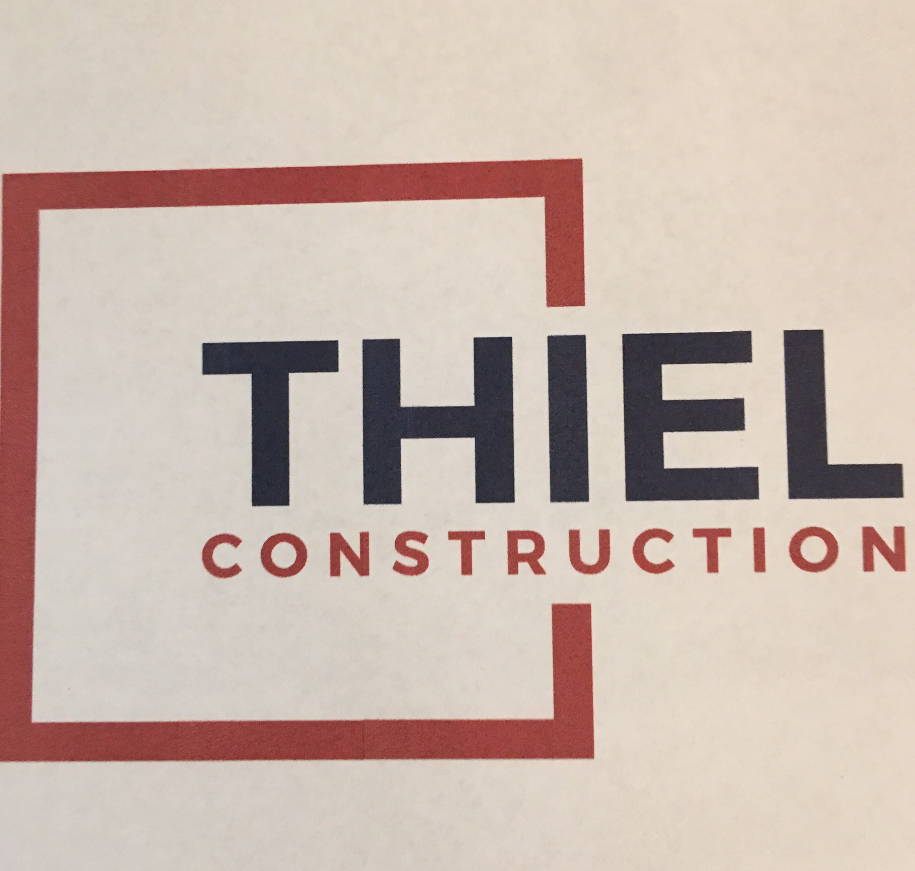 Logo for Thiel Construction