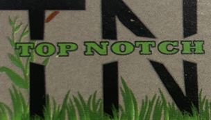Top notch landscaping & construction logo