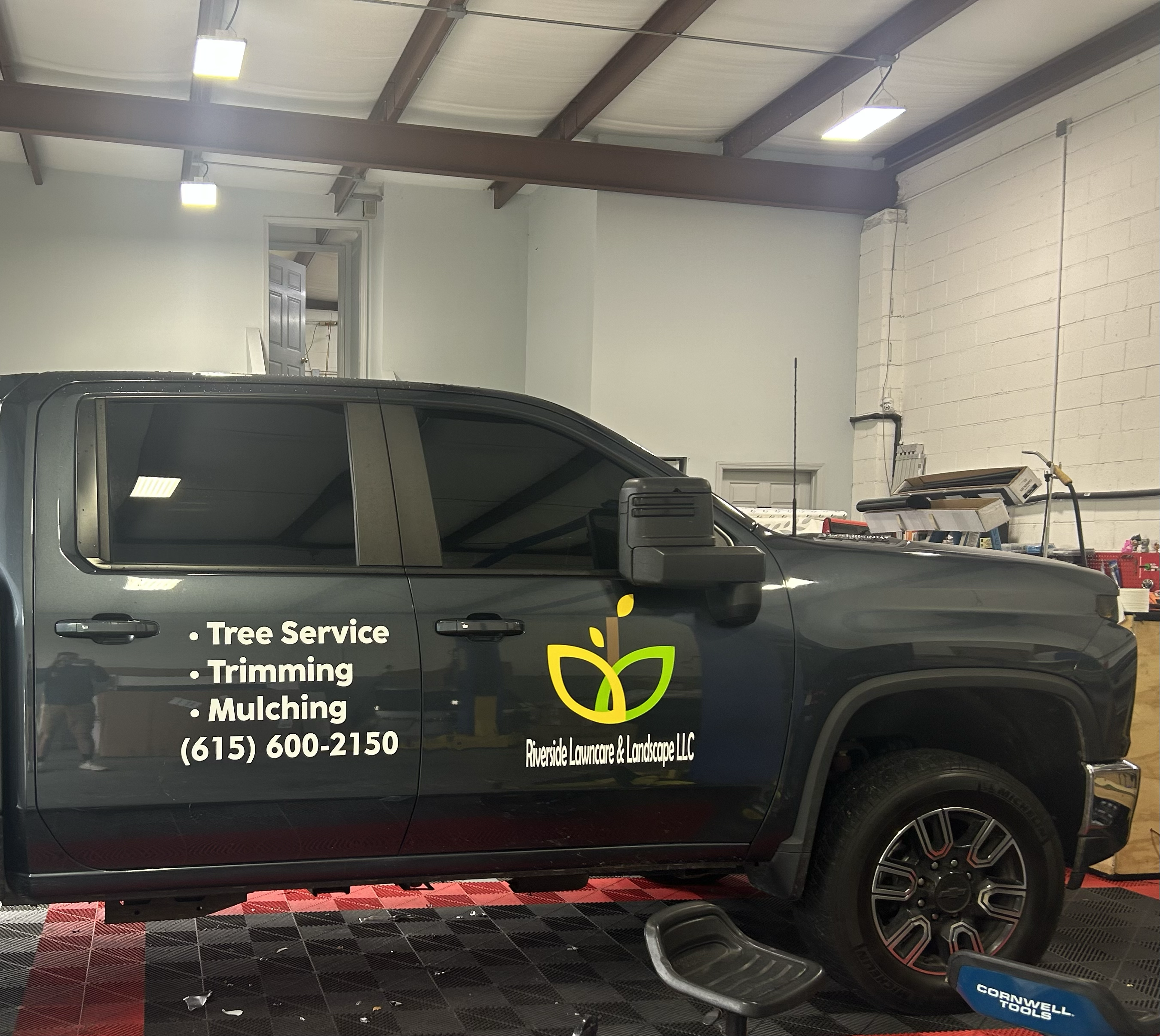 Logo for Riverside Lawncare & Landscape llc