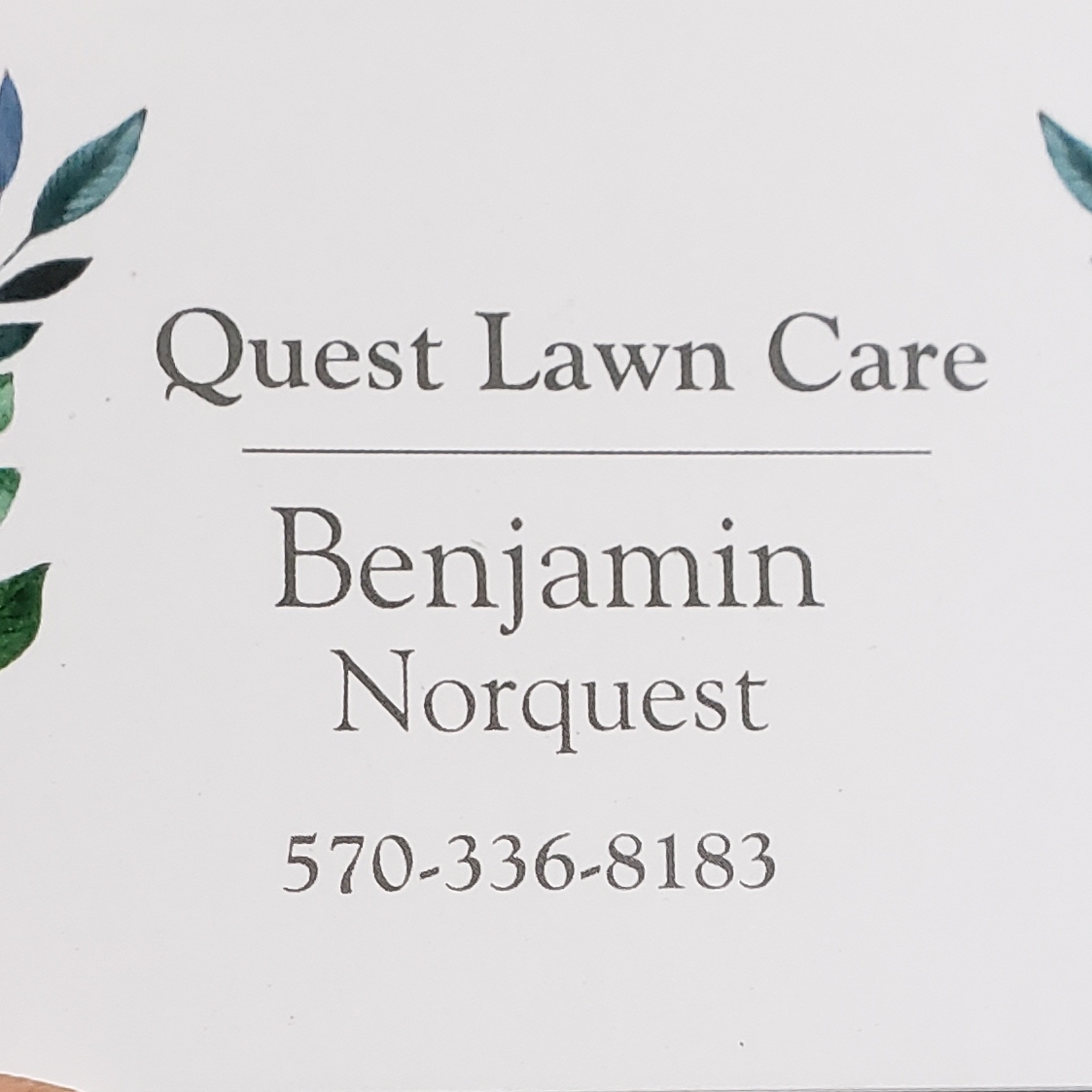 Logo for Quest Lawn Care