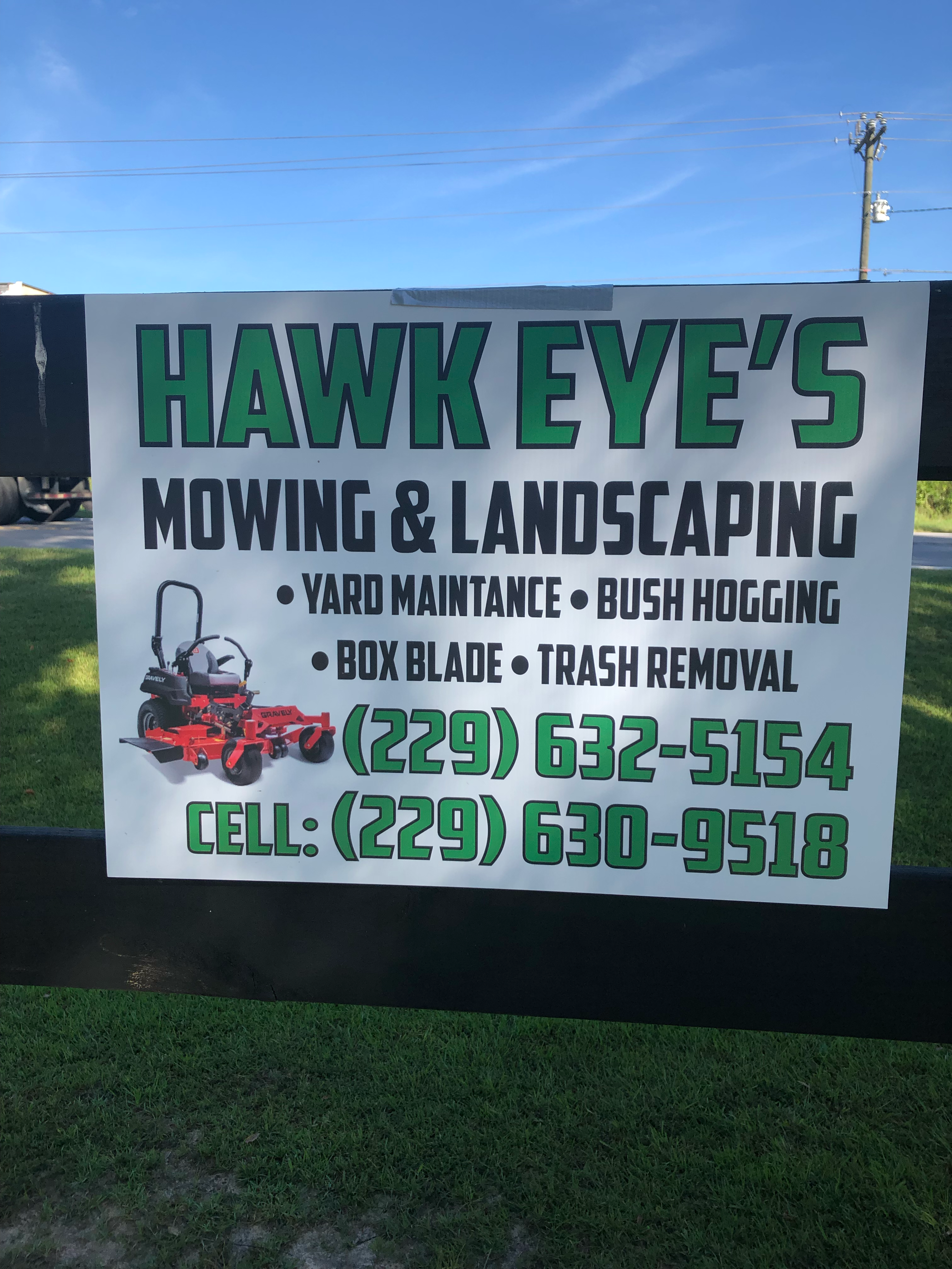 Hawkeye Mowing & Landscaping logo