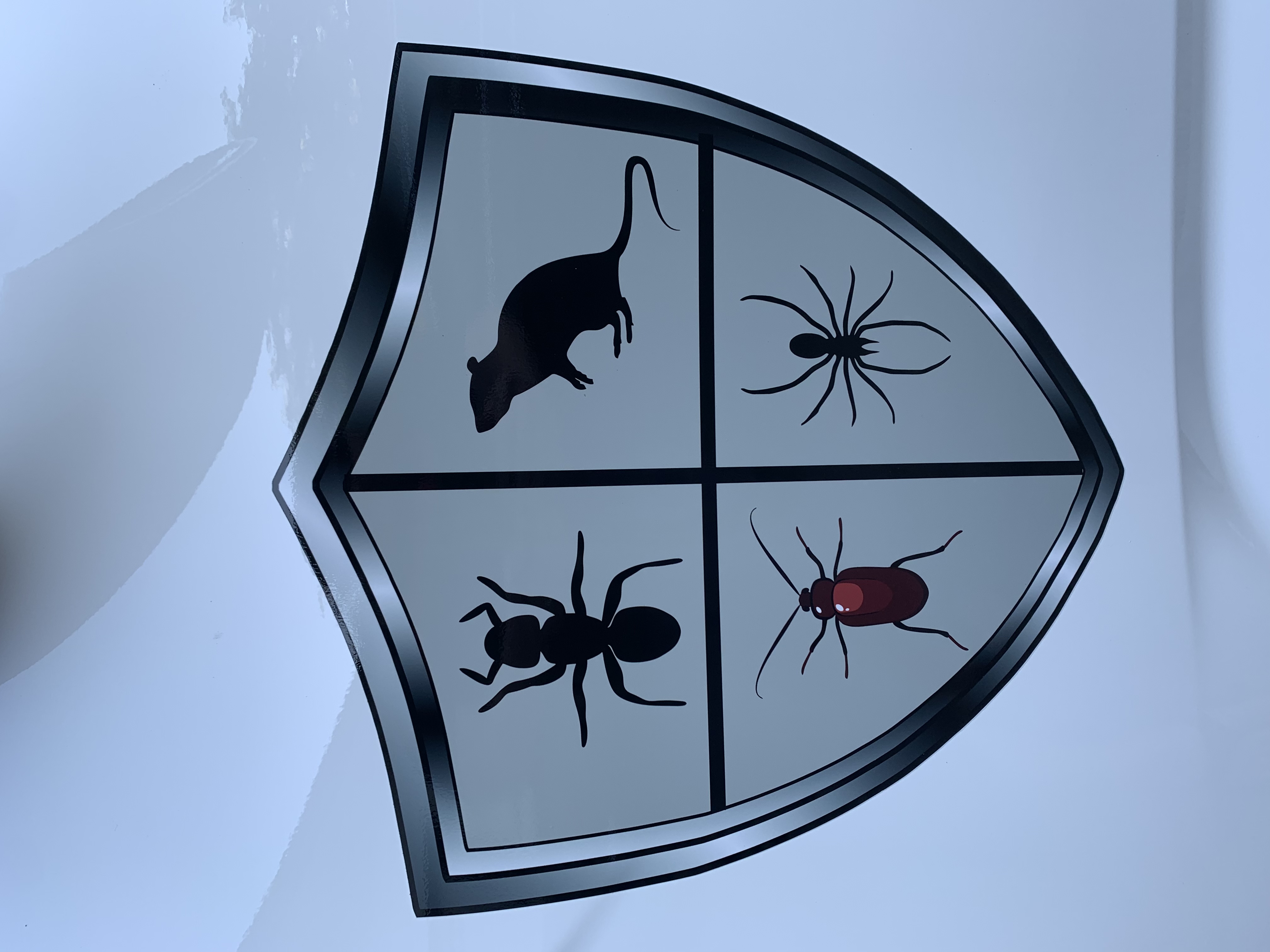 Rogue Valley Extermination Pest Control logo