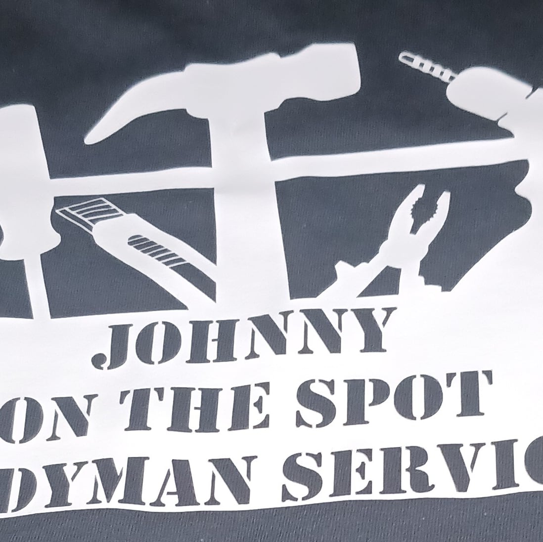 Johnny On the Spot Handyman Services logo