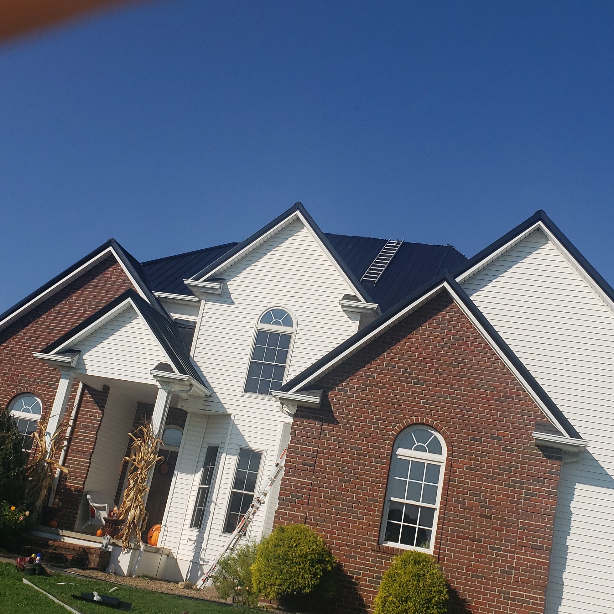 Nelson Weaver Metal Roofing logo