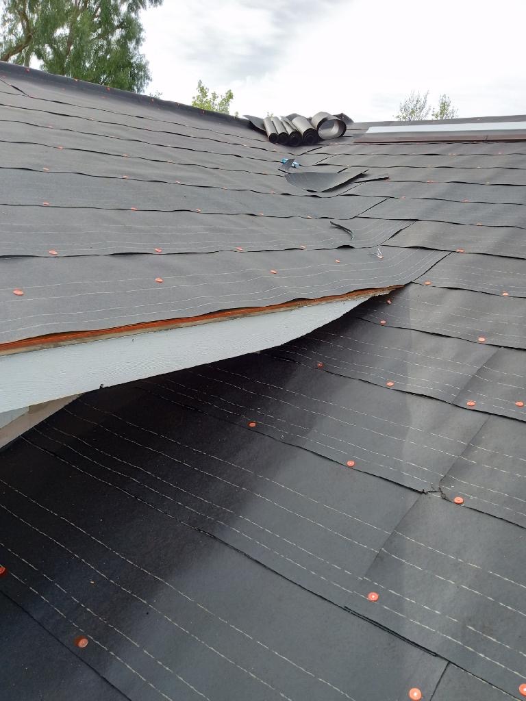 Logo for Vailes Handyman Service and Roof Repair