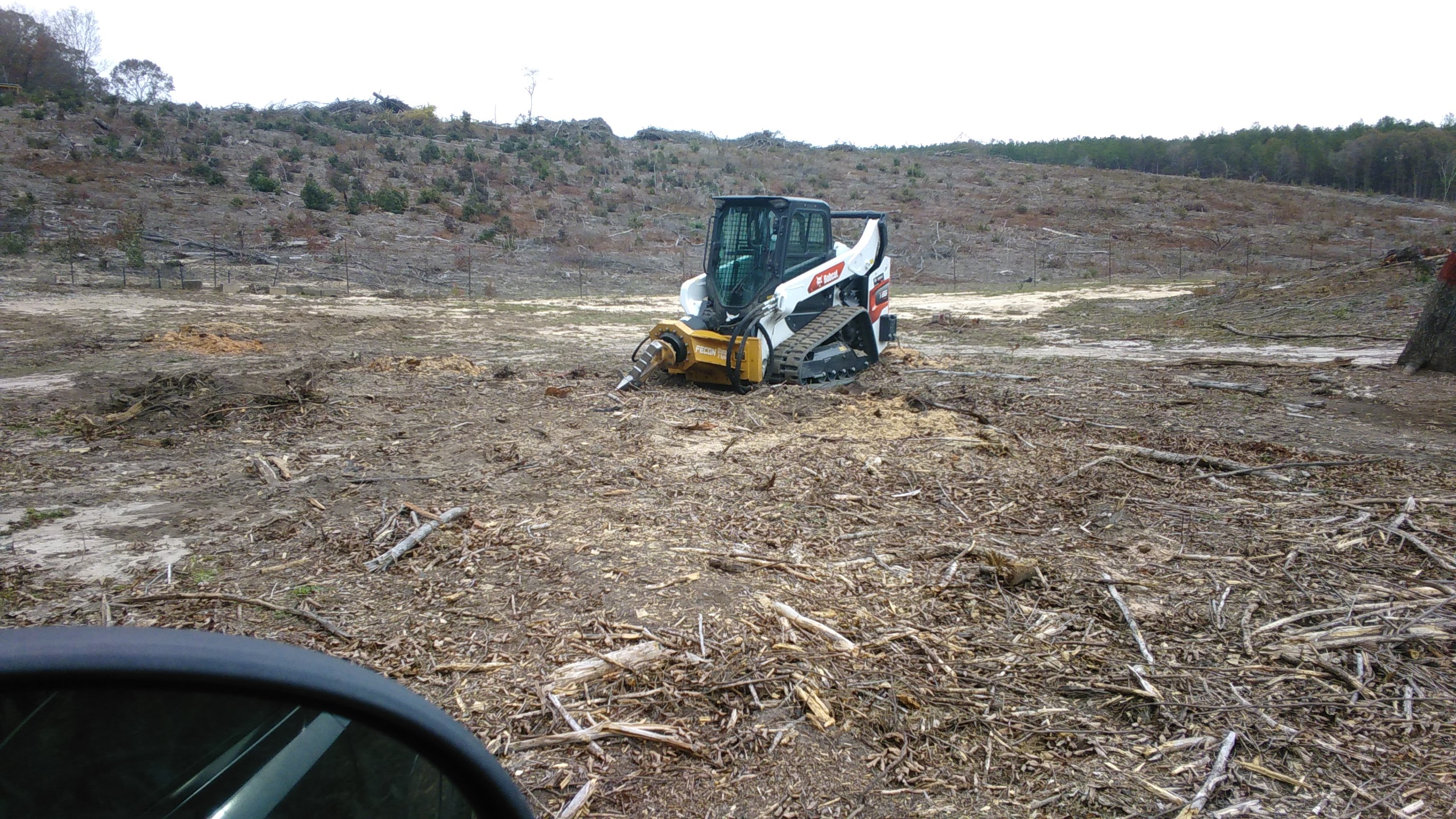 Dixieland land clearing logo