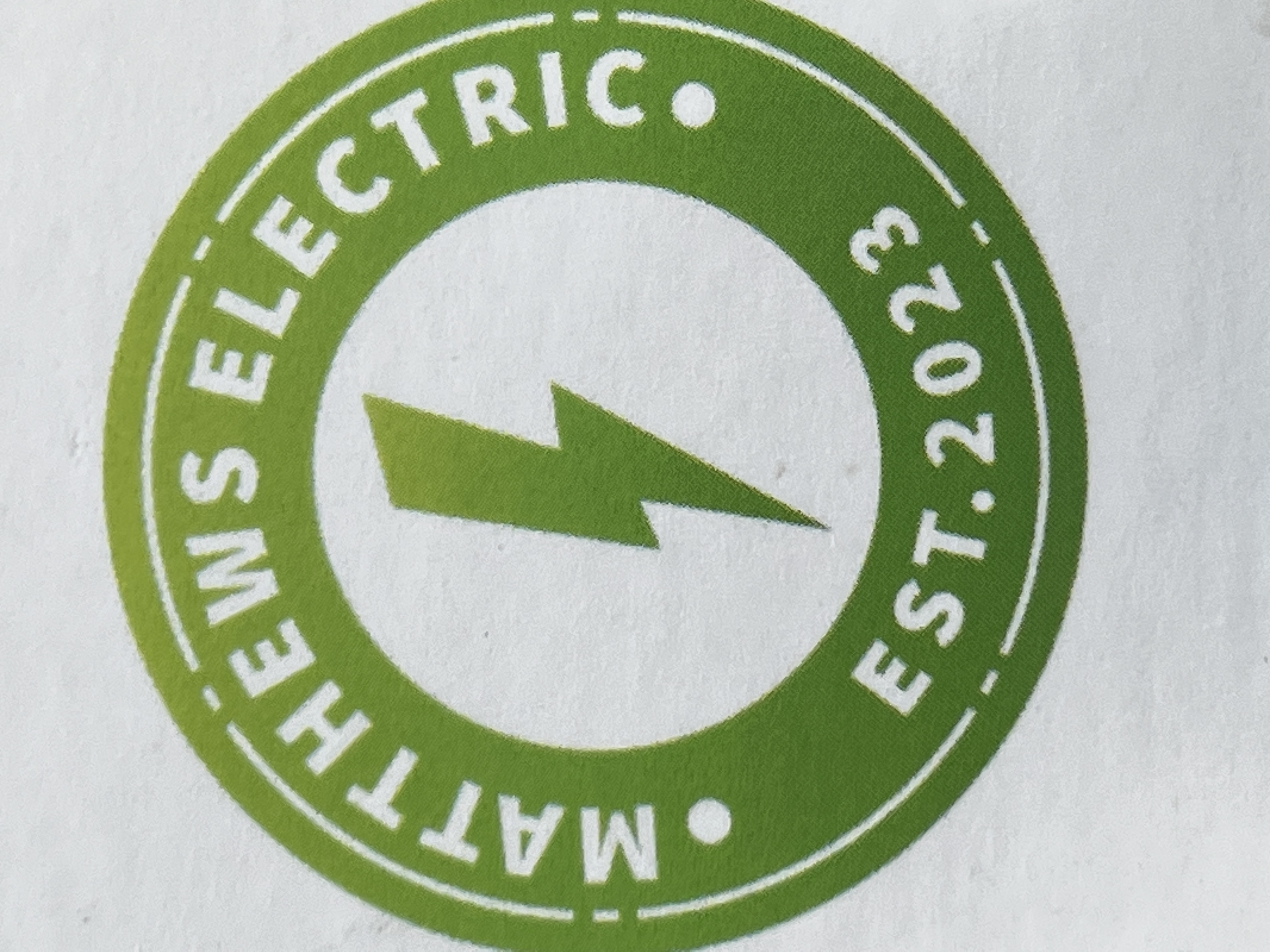 Matthews Electric logo