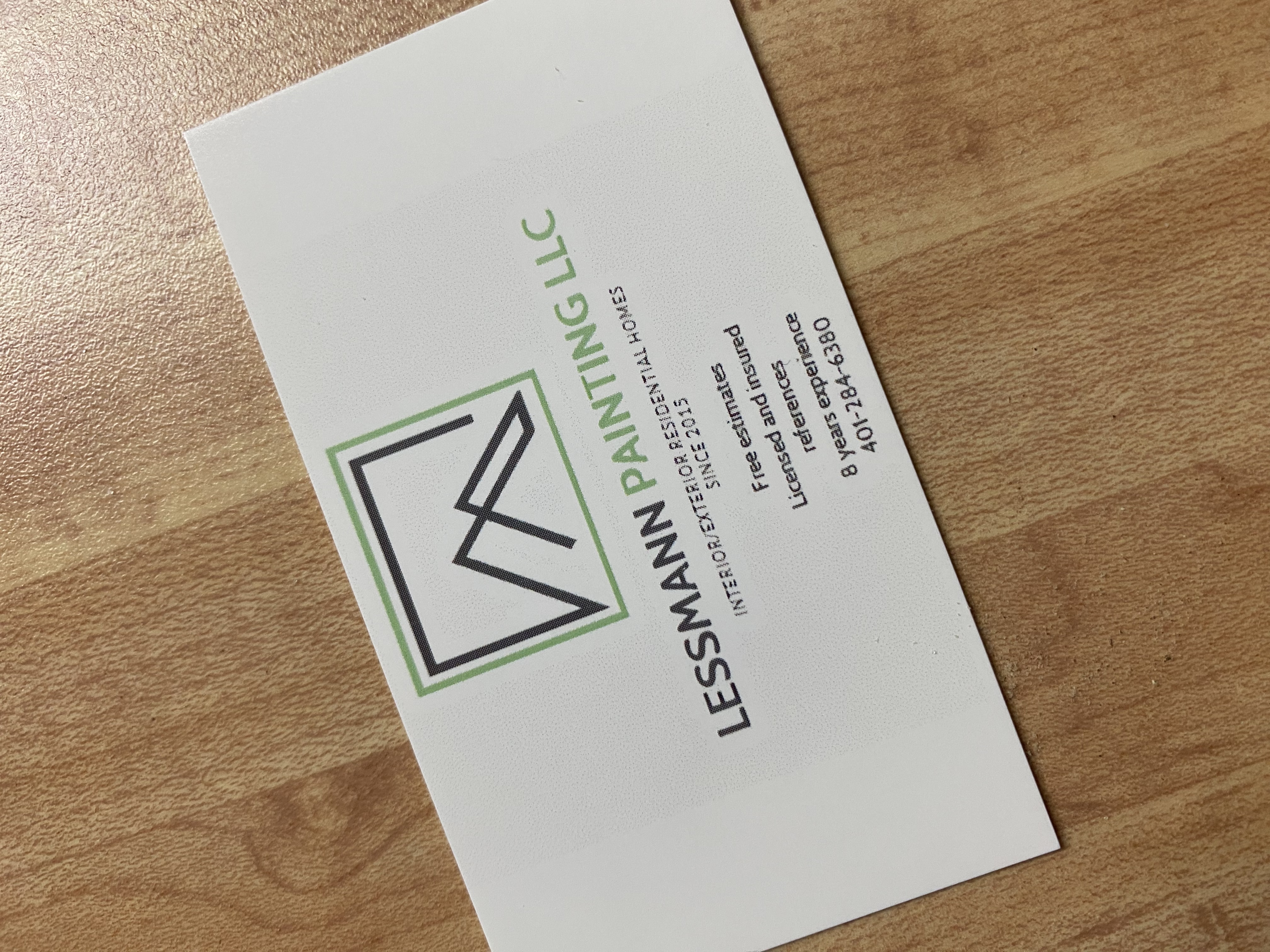 Logo for Lessmann Painting LLC