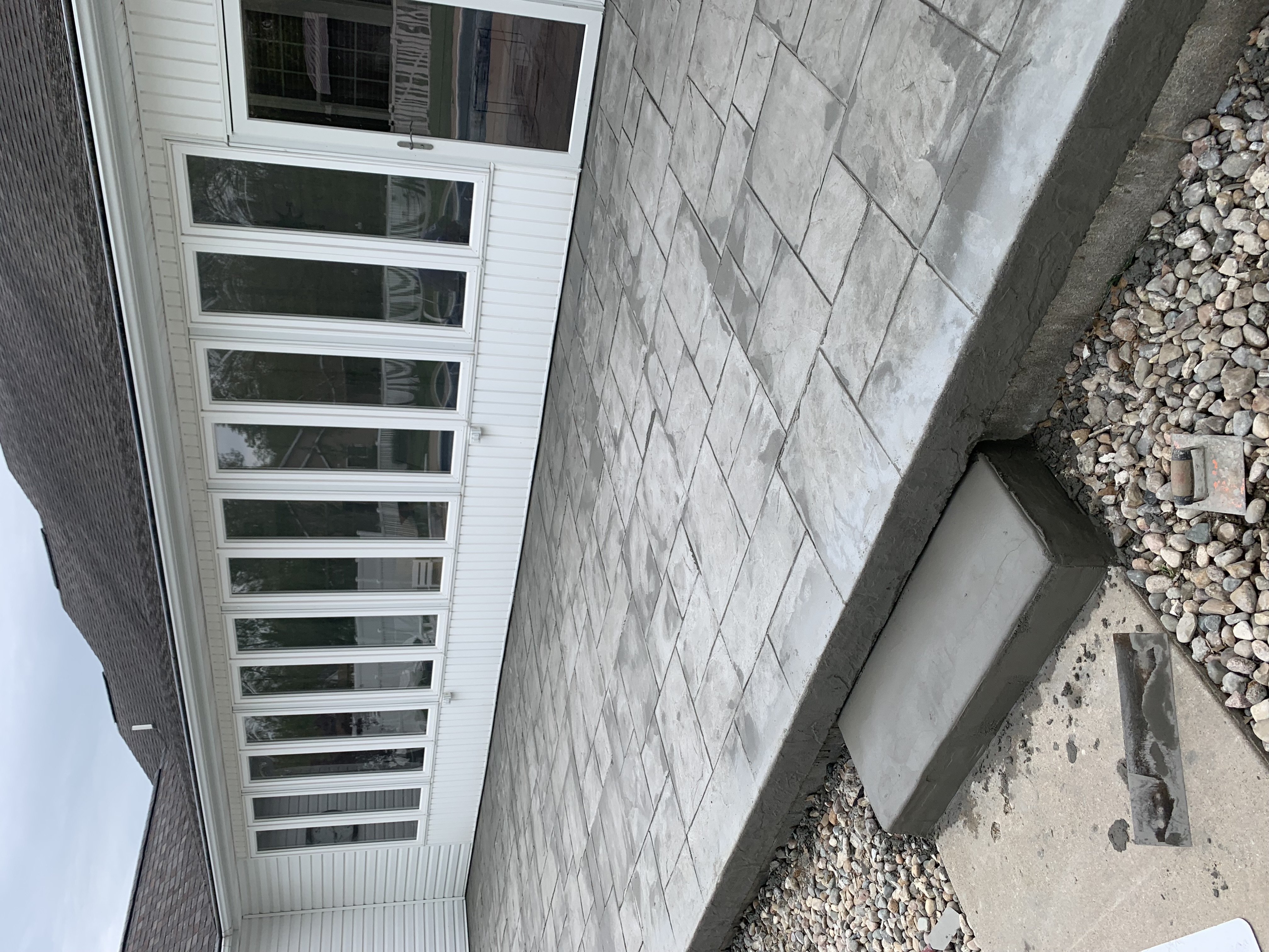 Brothers Concrete and Roofing logo
