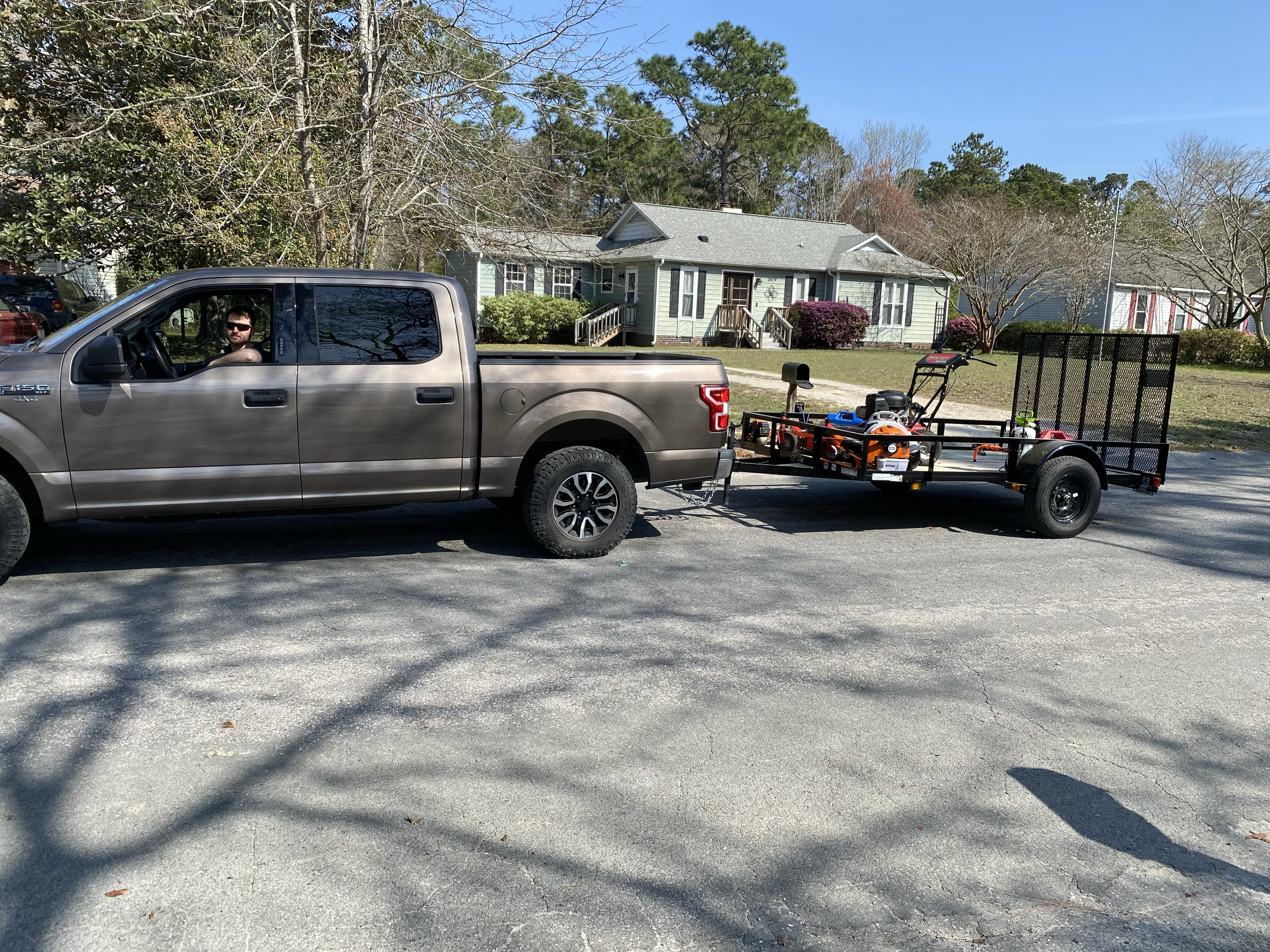 Logan lawn maintenance and trimming services logo