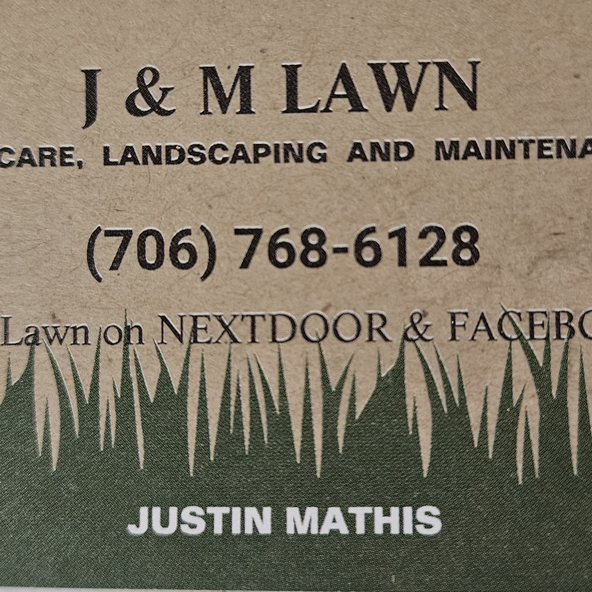 J & M Lawn logo