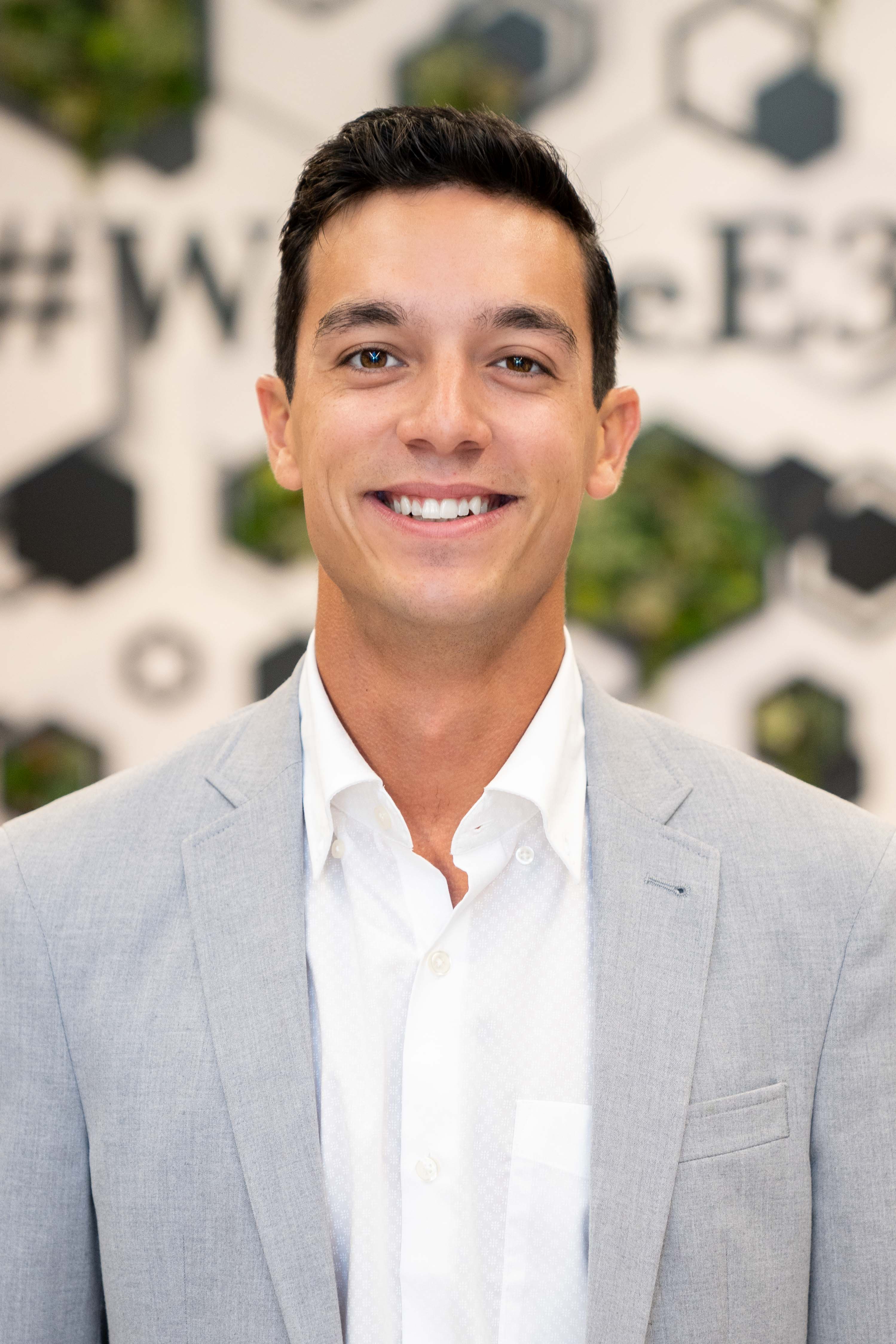 Logo for Riley Lambert