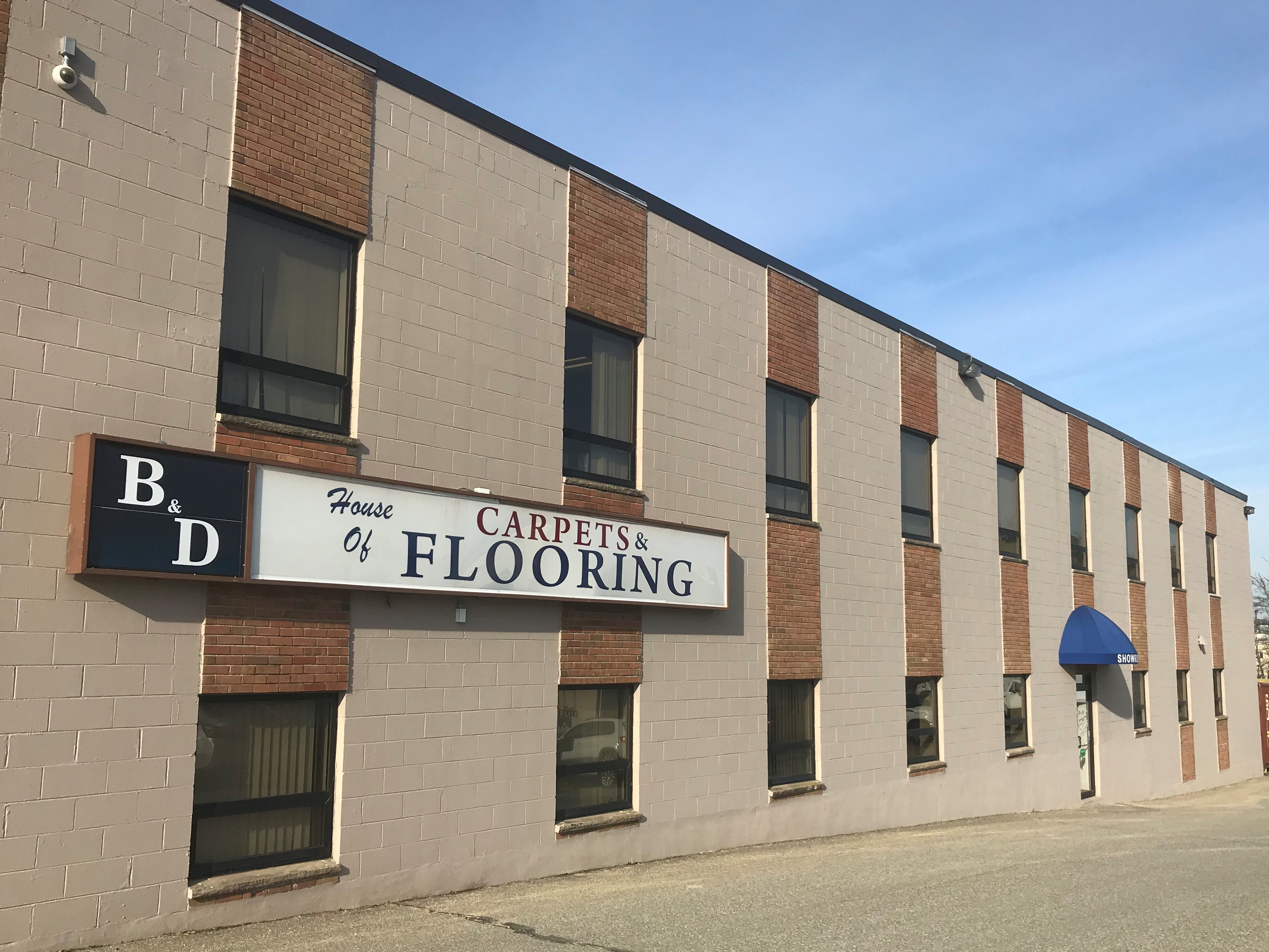 B & D House of Carpets and Flooring logo