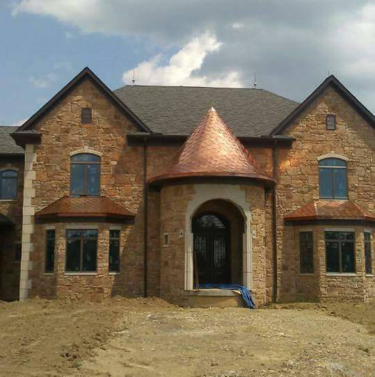 H & M ROOFING AND EXTERIORS logo
