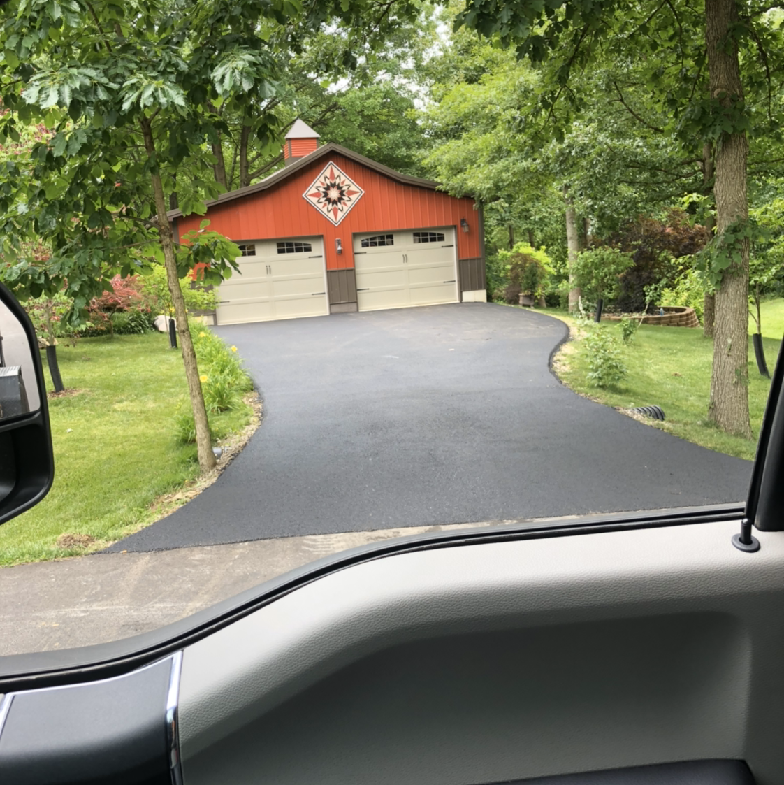 Fisher paving and sealcoating logo