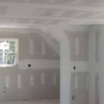 The Sheetrock Whisperer logo