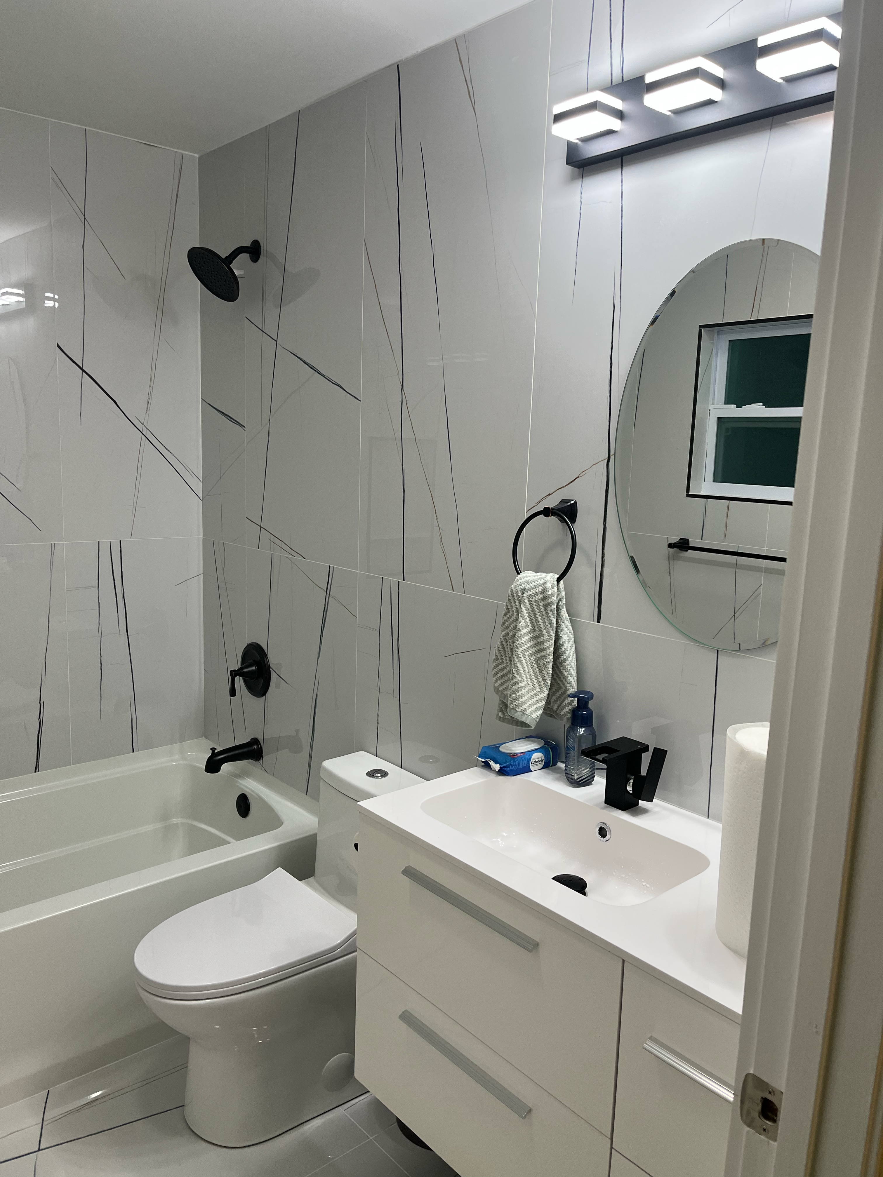 Mark's Marble & Tile logo