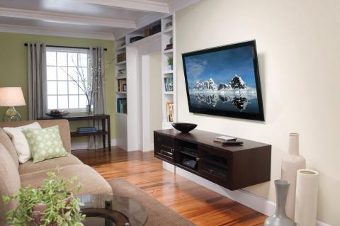 Contemporary Family Room with wall mounted entertainment center