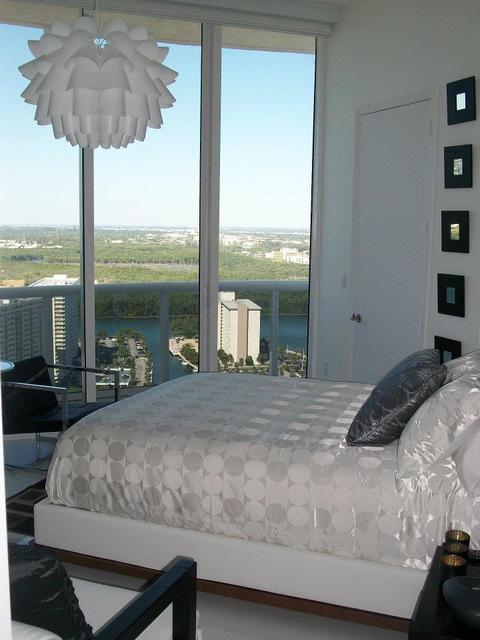 Contemporary Bedroom with contemporary white light fixture