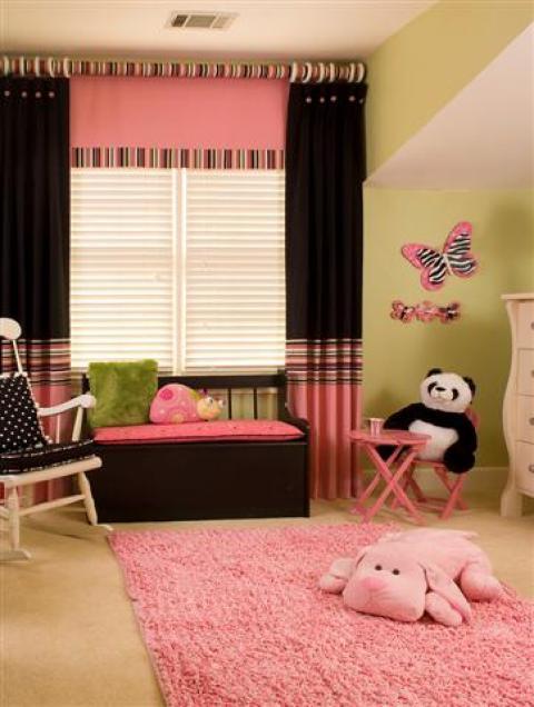 Eclectic Kids Room with brown and pick curtain