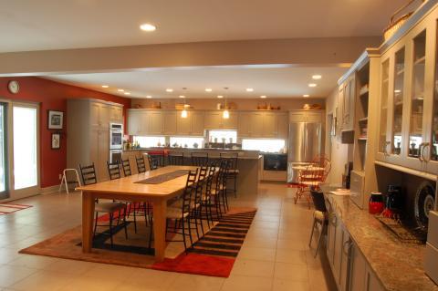 Contemporary Dining Room with stainless steel appliances