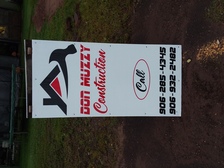Logo for Don Muzzy Construction