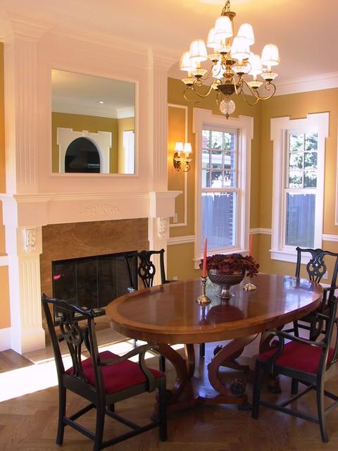Transitional Dining Room with crown moulding mantle