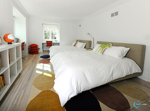 Contemporary Bedroom with strip hardwood floor
