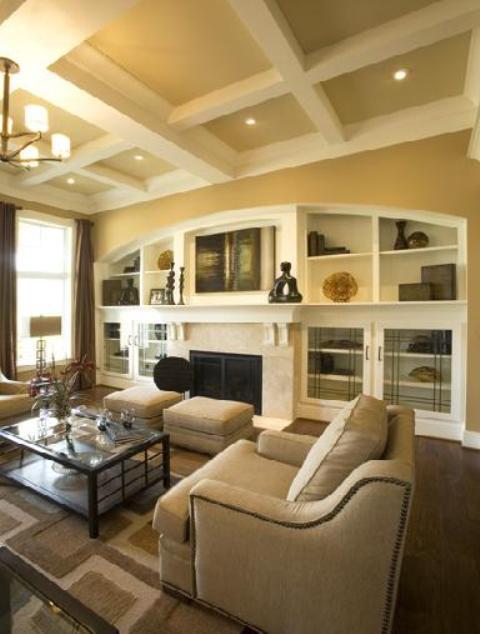 Traditional Living Room with white built in shelves